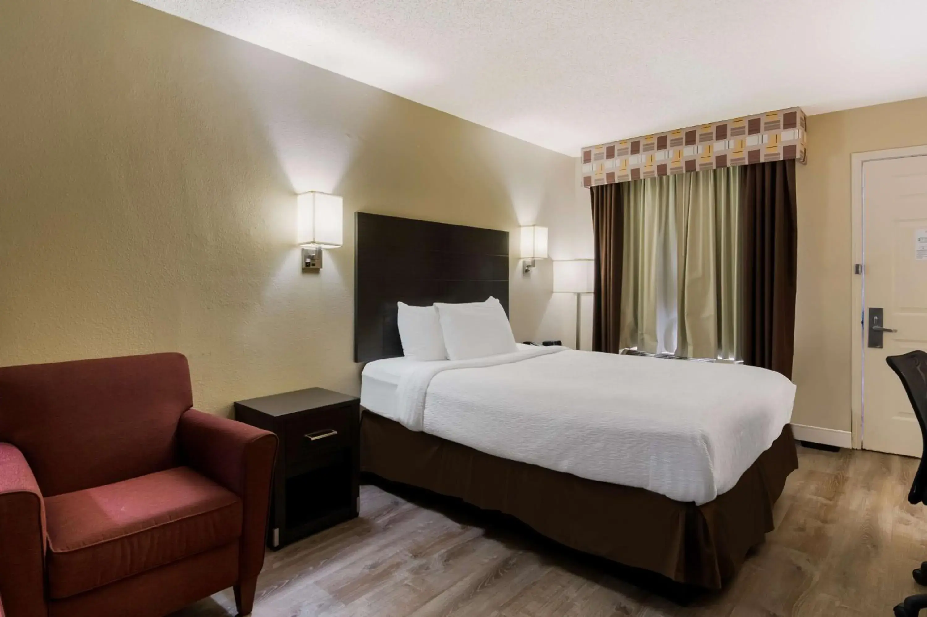 Bedroom, Bed in SureStay Plus Hotel by Best Western Jackson Bedroom, Bed in SureStay Plus Hotel by Best Western Jackson