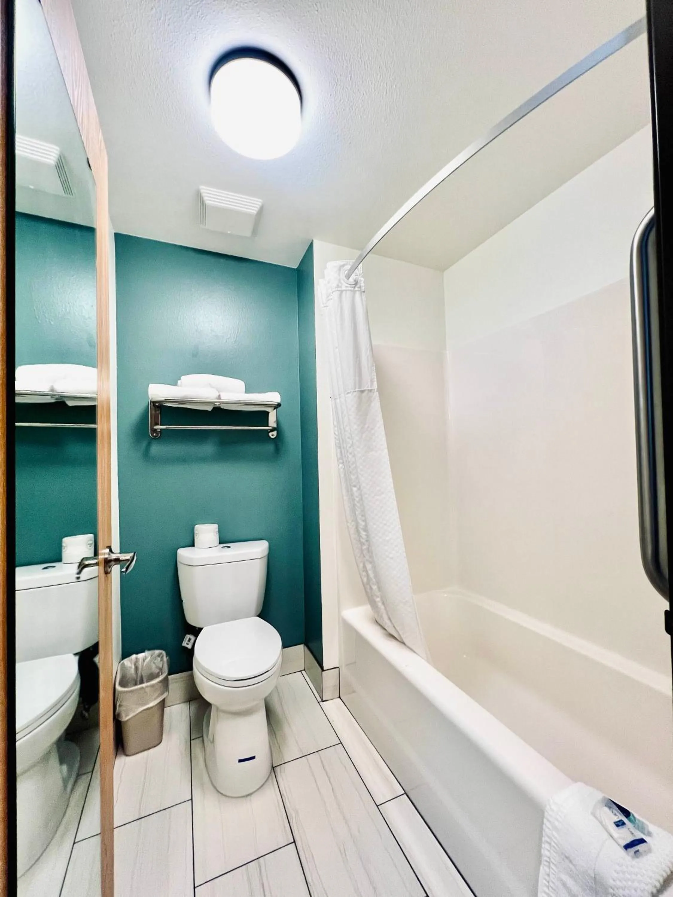 Toilet in Super 8 by Wyndham Verona/Madison