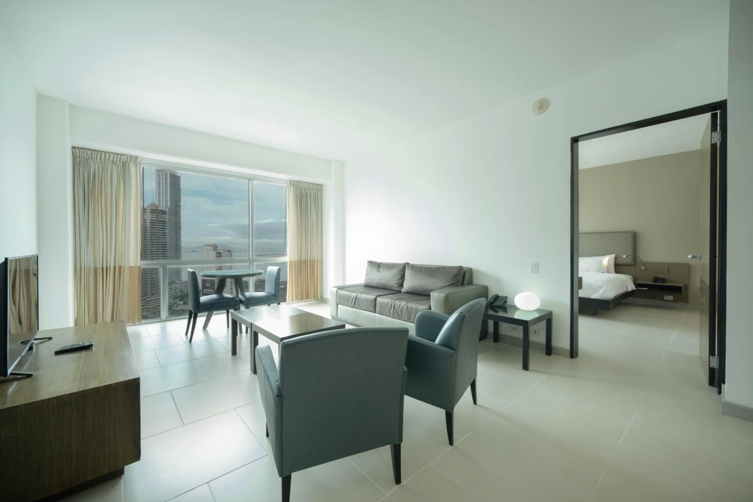 Living room, Bed in Decapolis Hotel Panama City