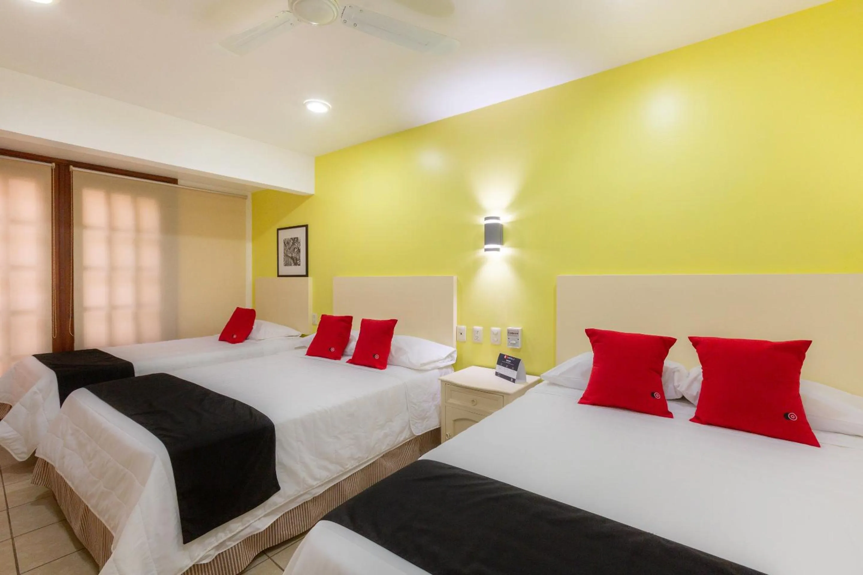 Bedroom in Capital O Oaxaca Guest Hotel