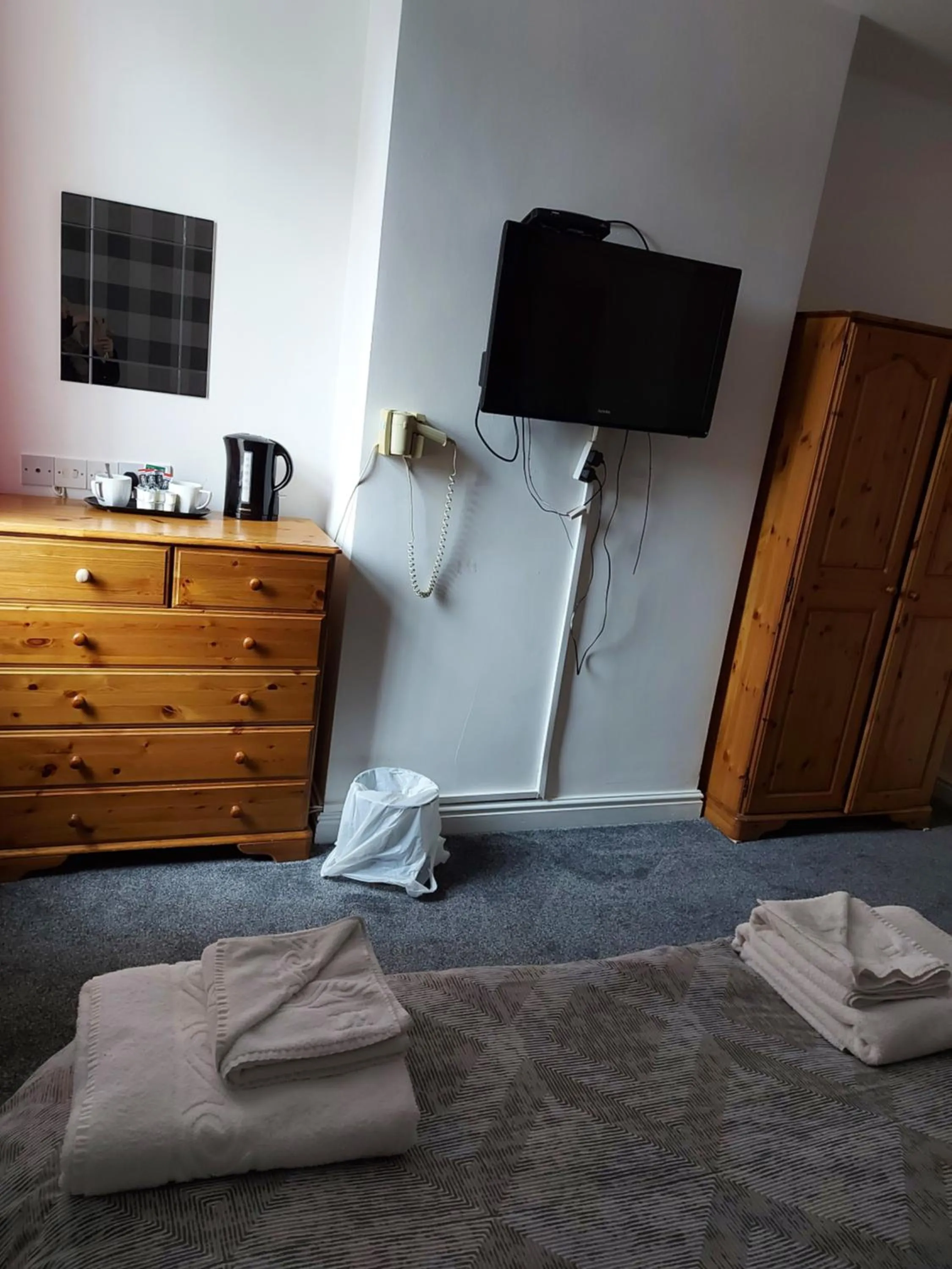 Bed in Ambrose Hotel