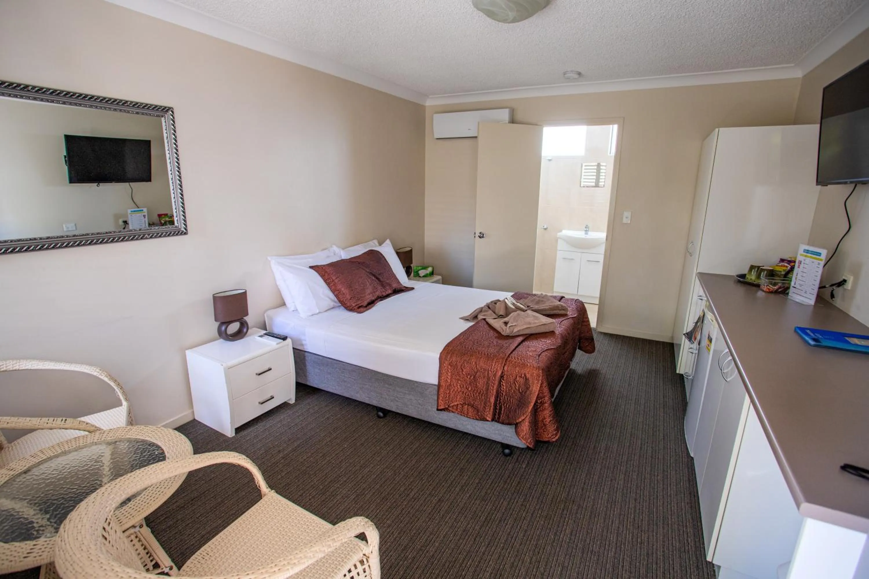 Bed in Tropicana Motel