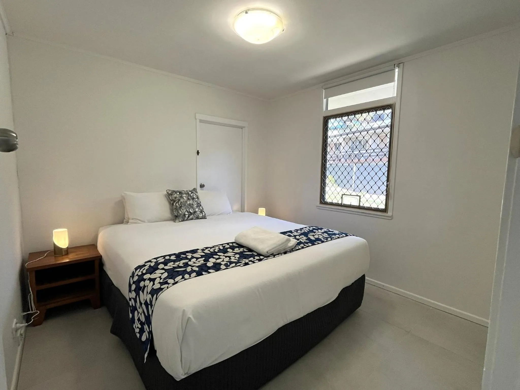 Bed in Tropicana Motel