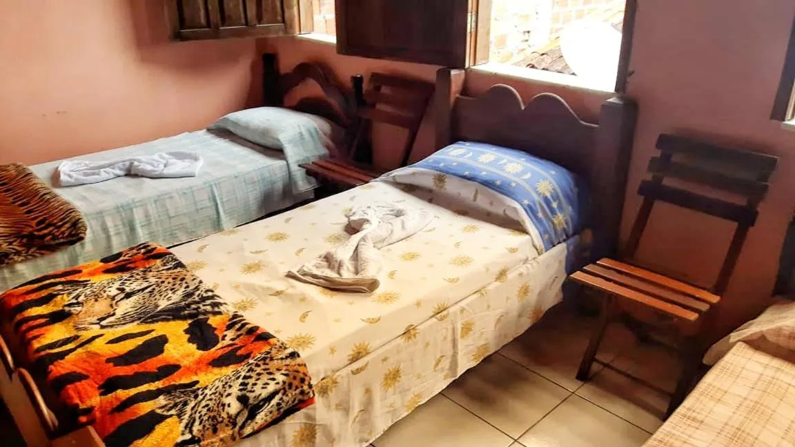 Bed in Pousada Labarca