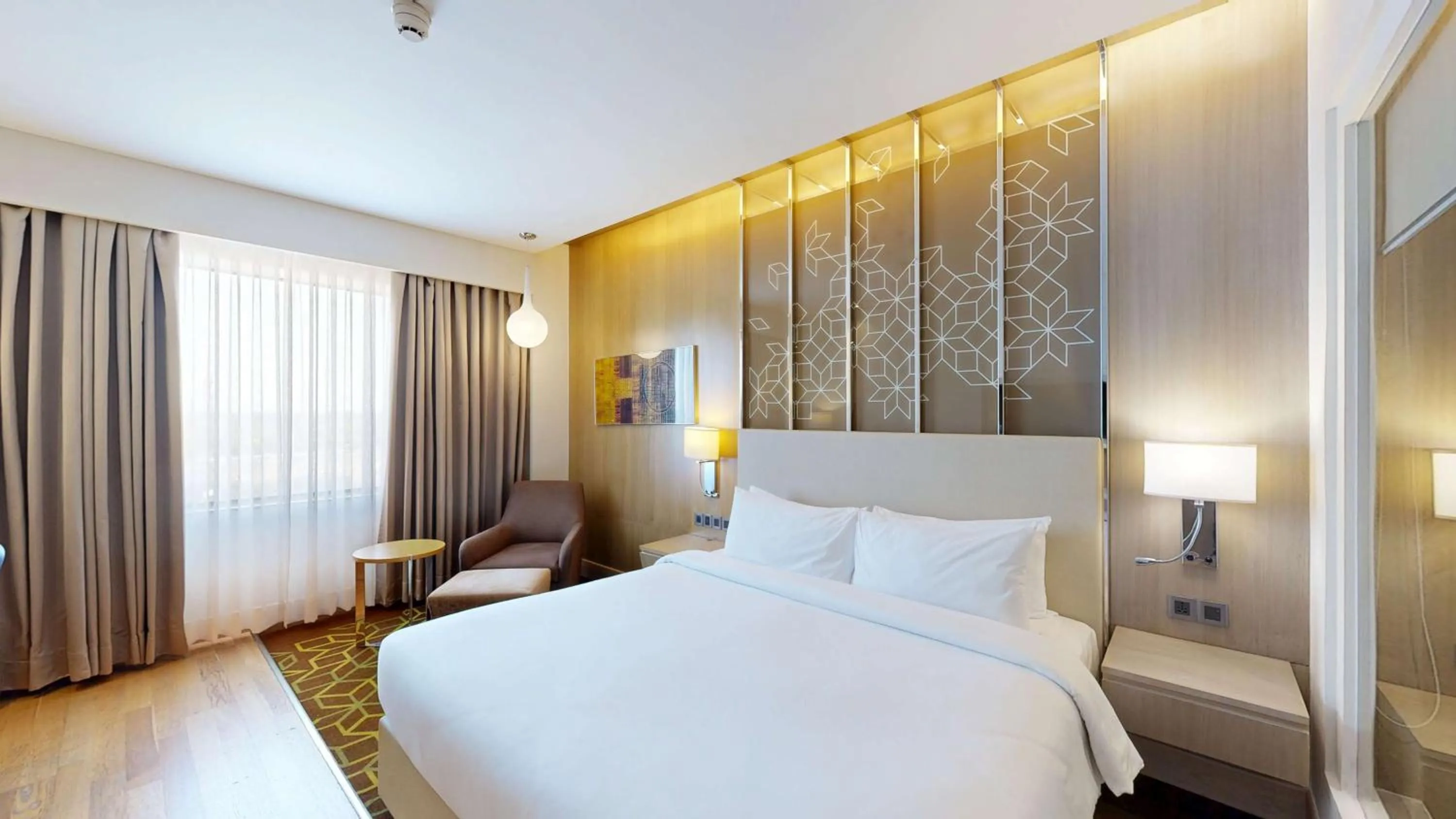 Bedroom, Bed in Radisson Gurugram Udyog Vihar