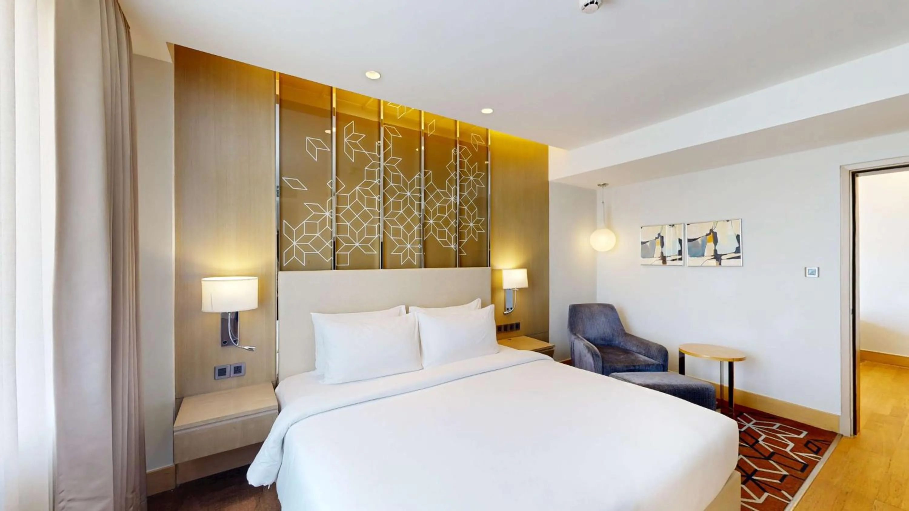 Photo of the whole room, Bed in Radisson Gurugram Udyog Vihar