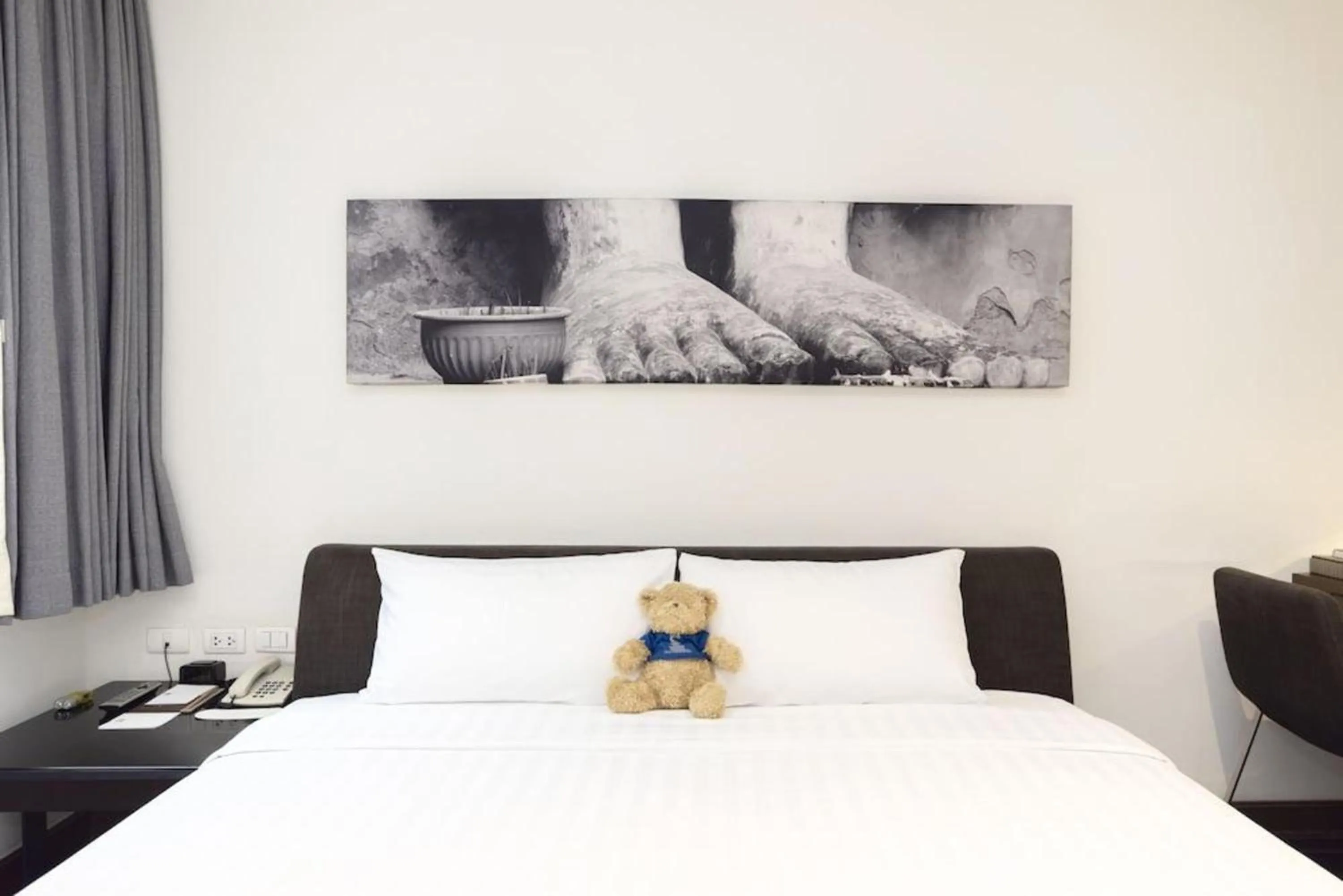 Bed in S33 Compact Sukhumvit Hotel