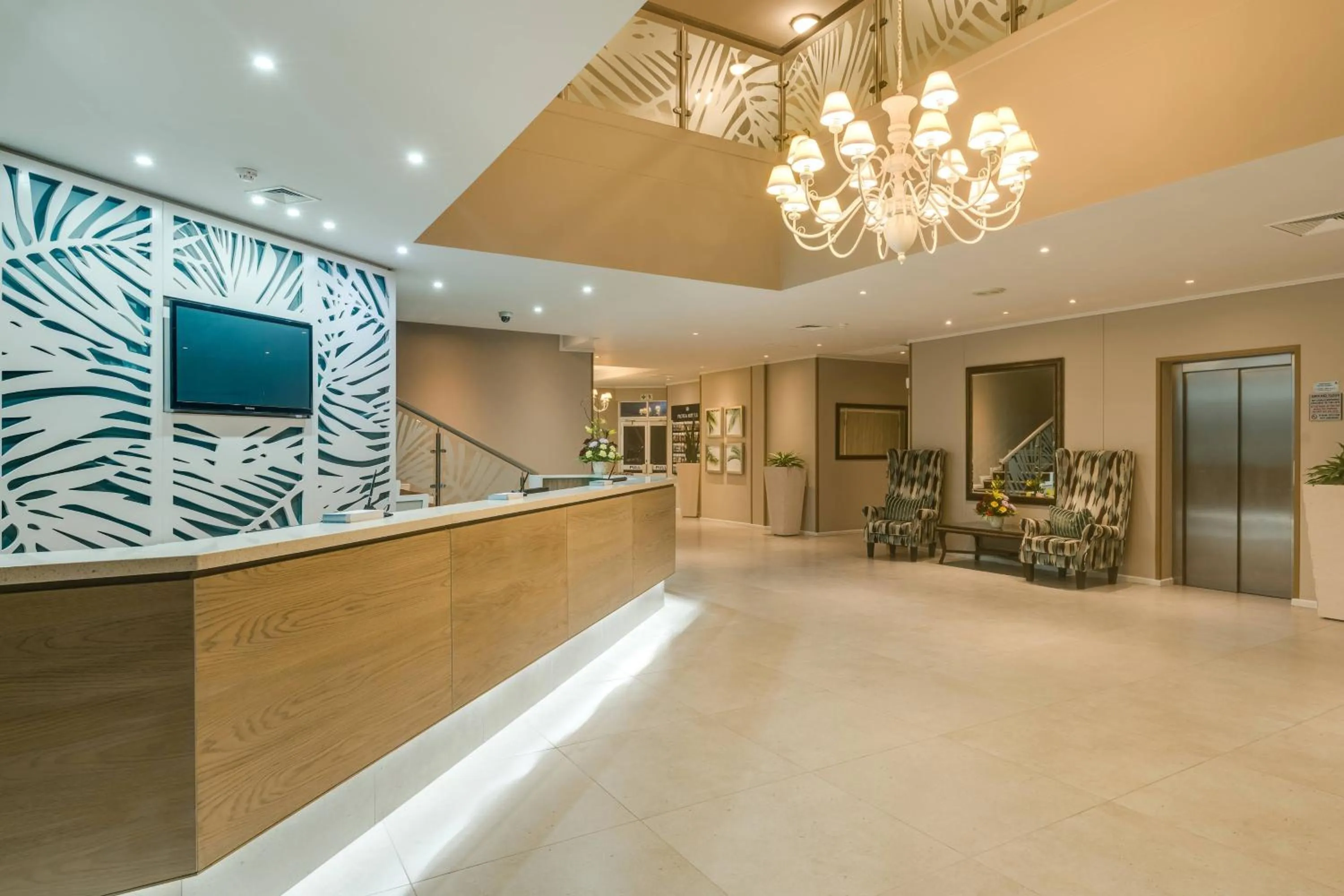 Lobby or reception in Protea Hotel by Marriott Karridene Beach