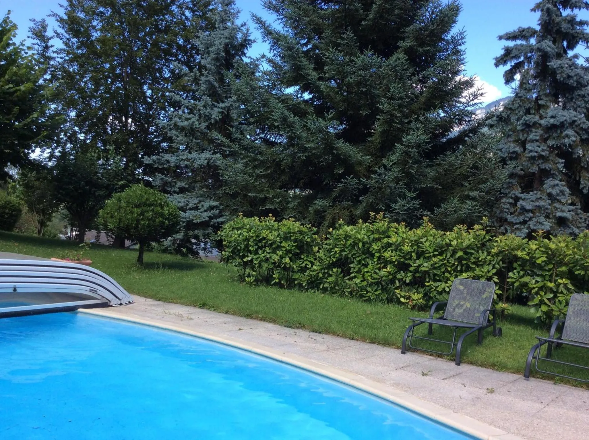 Swimming pool in Demeure d'hôtes Les Irisynes