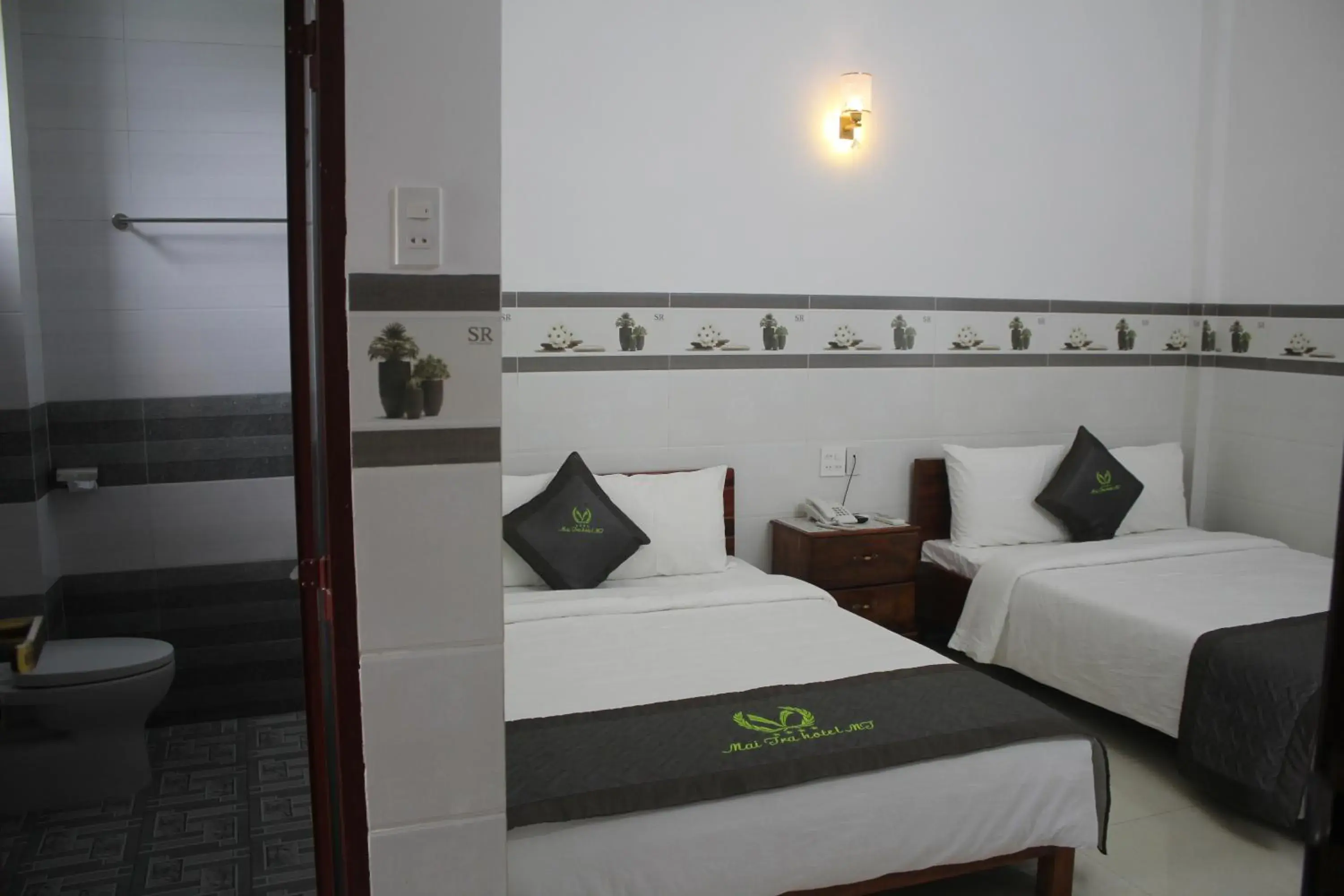 Quadruple Room with Balcony in Mai Tra Hotel Quadruple Room with Balcony in Mai Tra Hotel