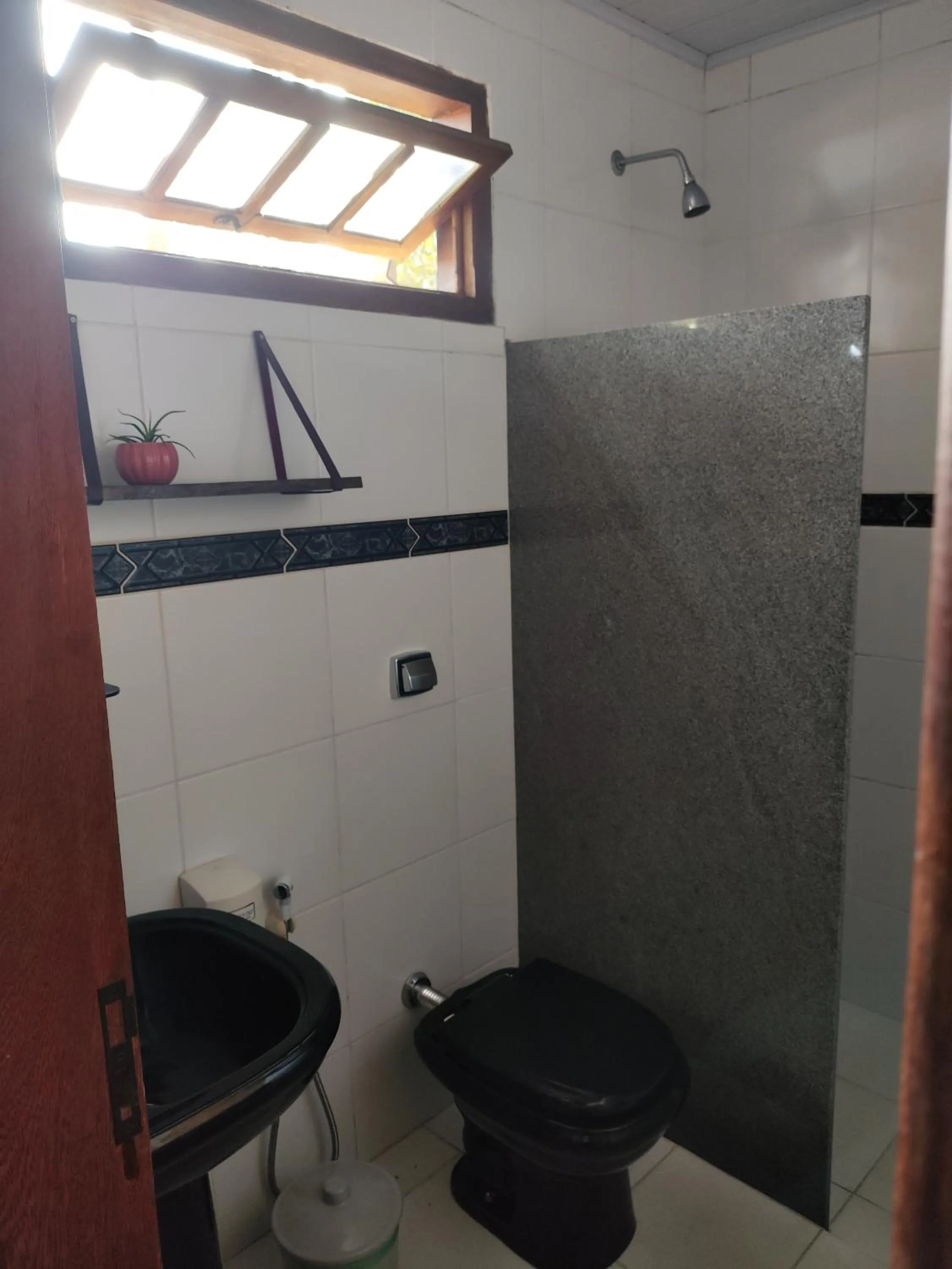 Bathroom in TEMPLÁRIOS ECOVILLA Pousada