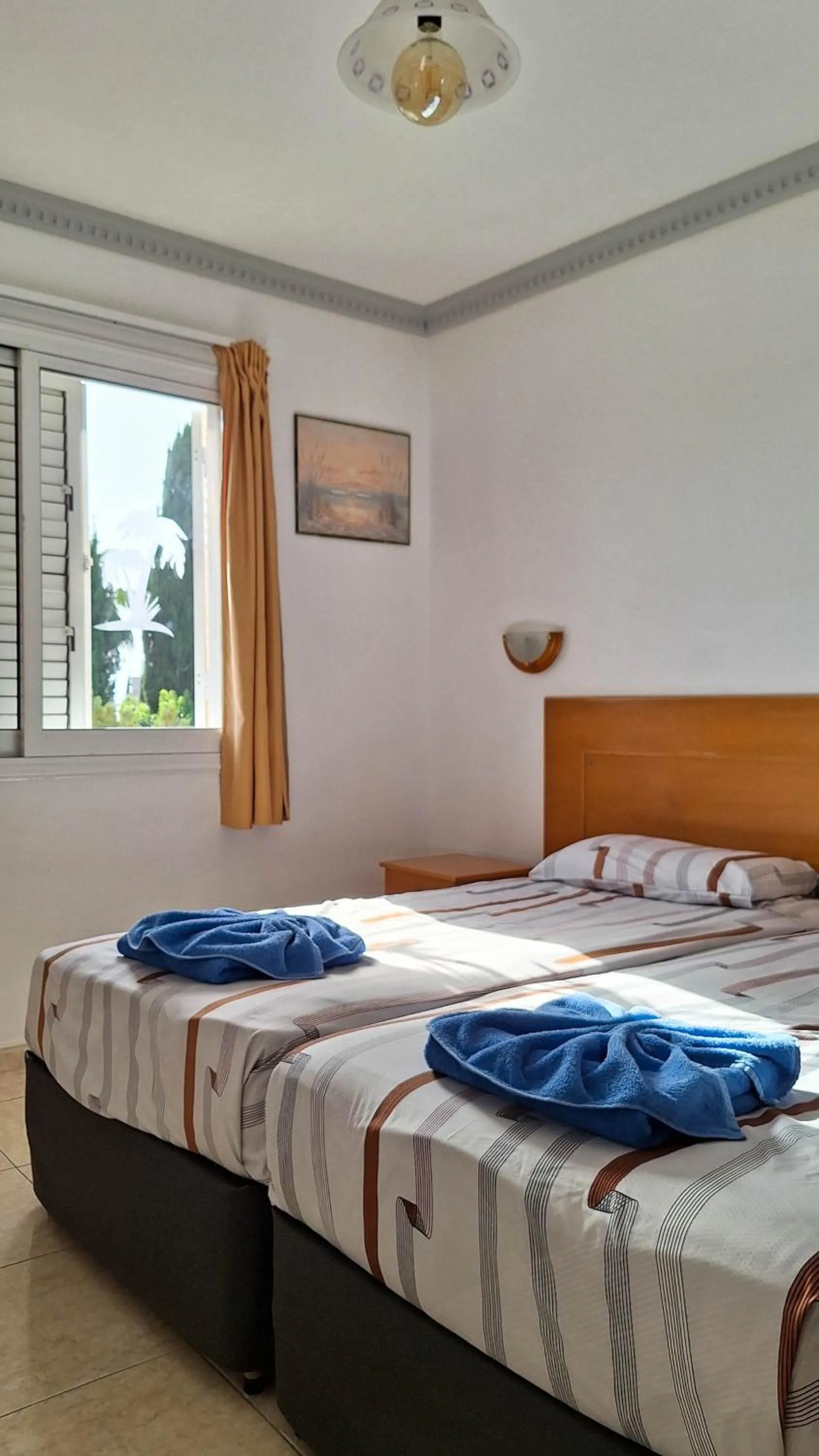 Bed in Apollonia Hotel Apartments