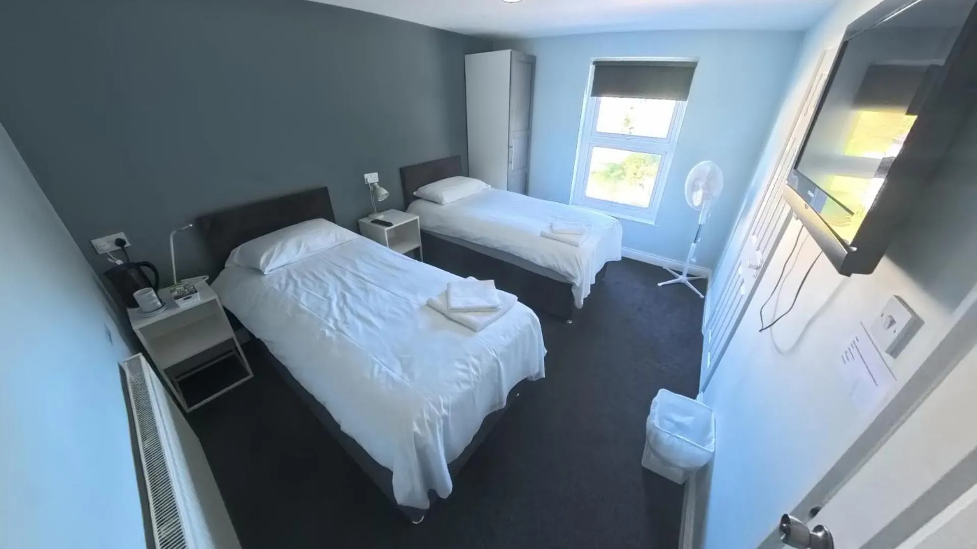 Photo of the whole room, Bed in The Riverside