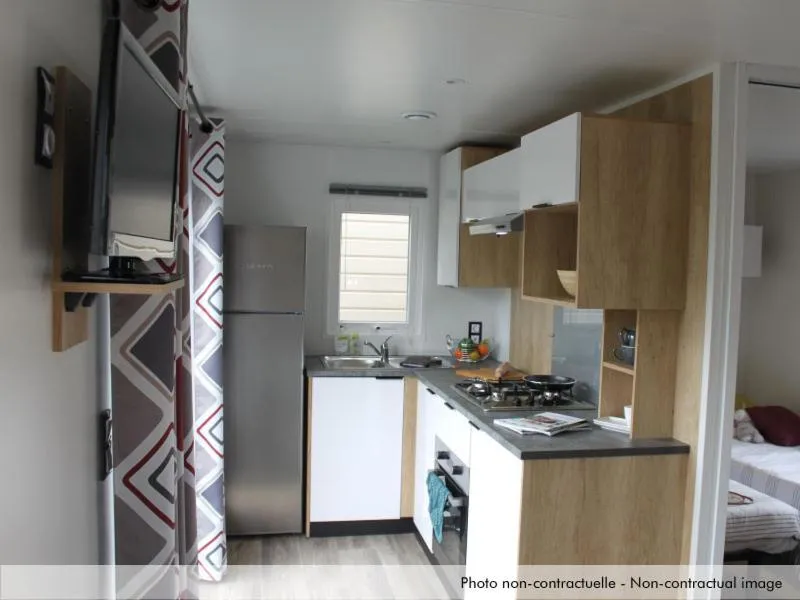 Kitchen or kitchenette in Camping Officiel Siblu Les Rives de Condrieu