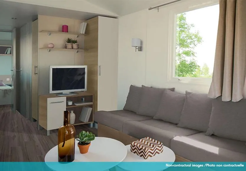Living room in Camping Officiel Siblu Les Rives de Condrieu