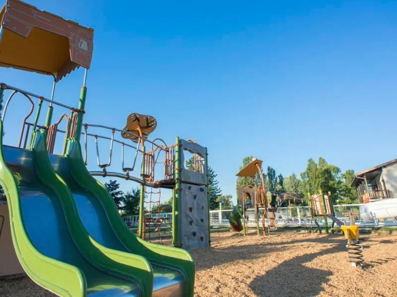 Children play ground in Camping Officiel Siblu Les Rives de Condrieu
