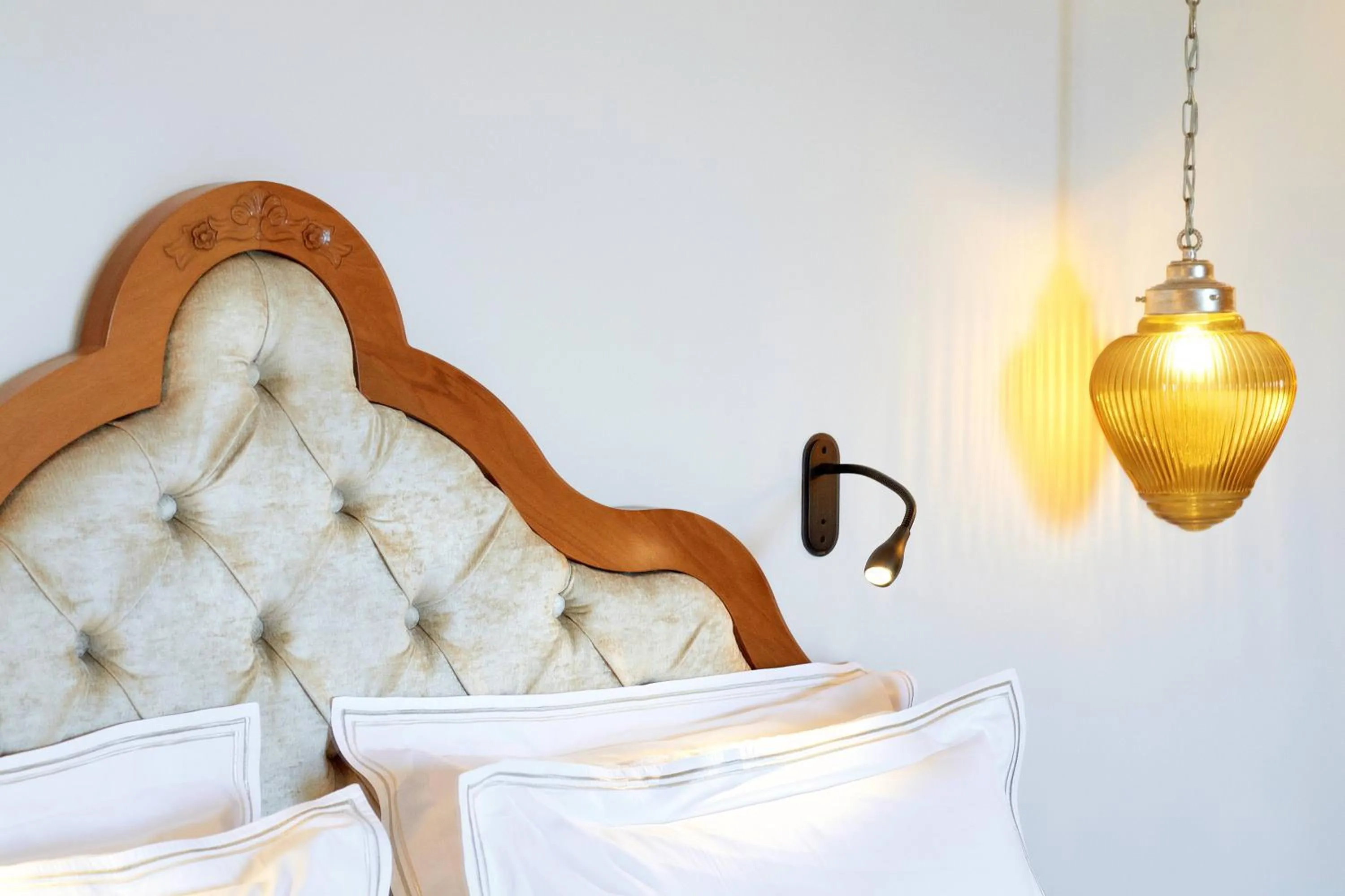 Bed in Legacy Gastro Suites