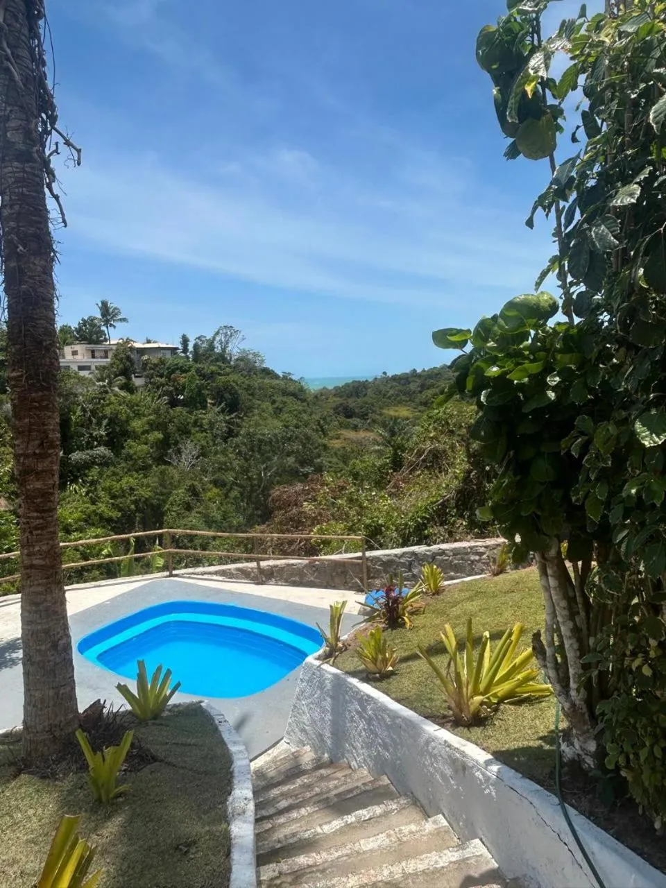 Swimming pool in Pousada Jardim das Bromélias