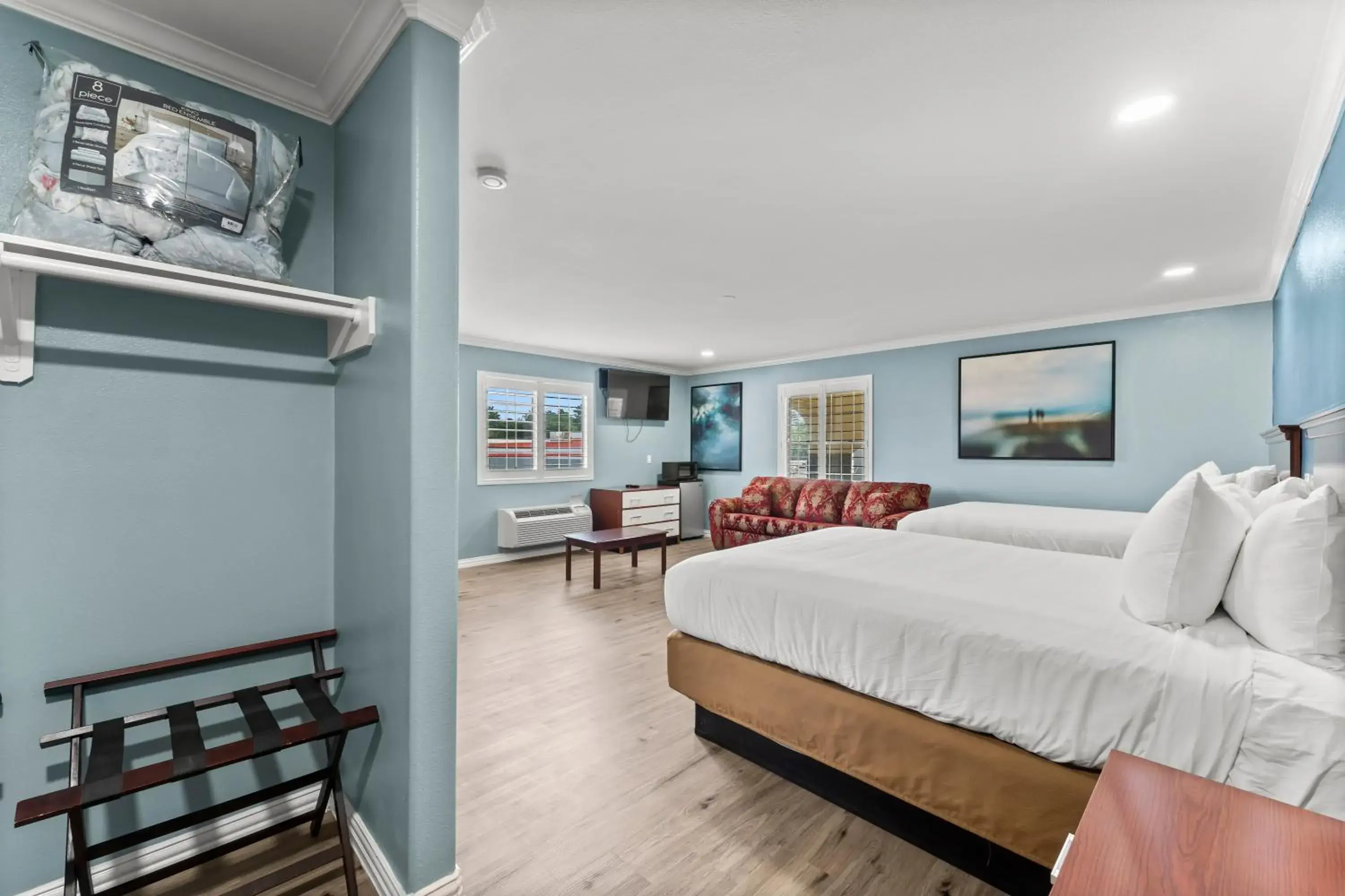 Bed in Executive Inn & Suites Magnolia Bed in Executive Inn & Suites Magnolia