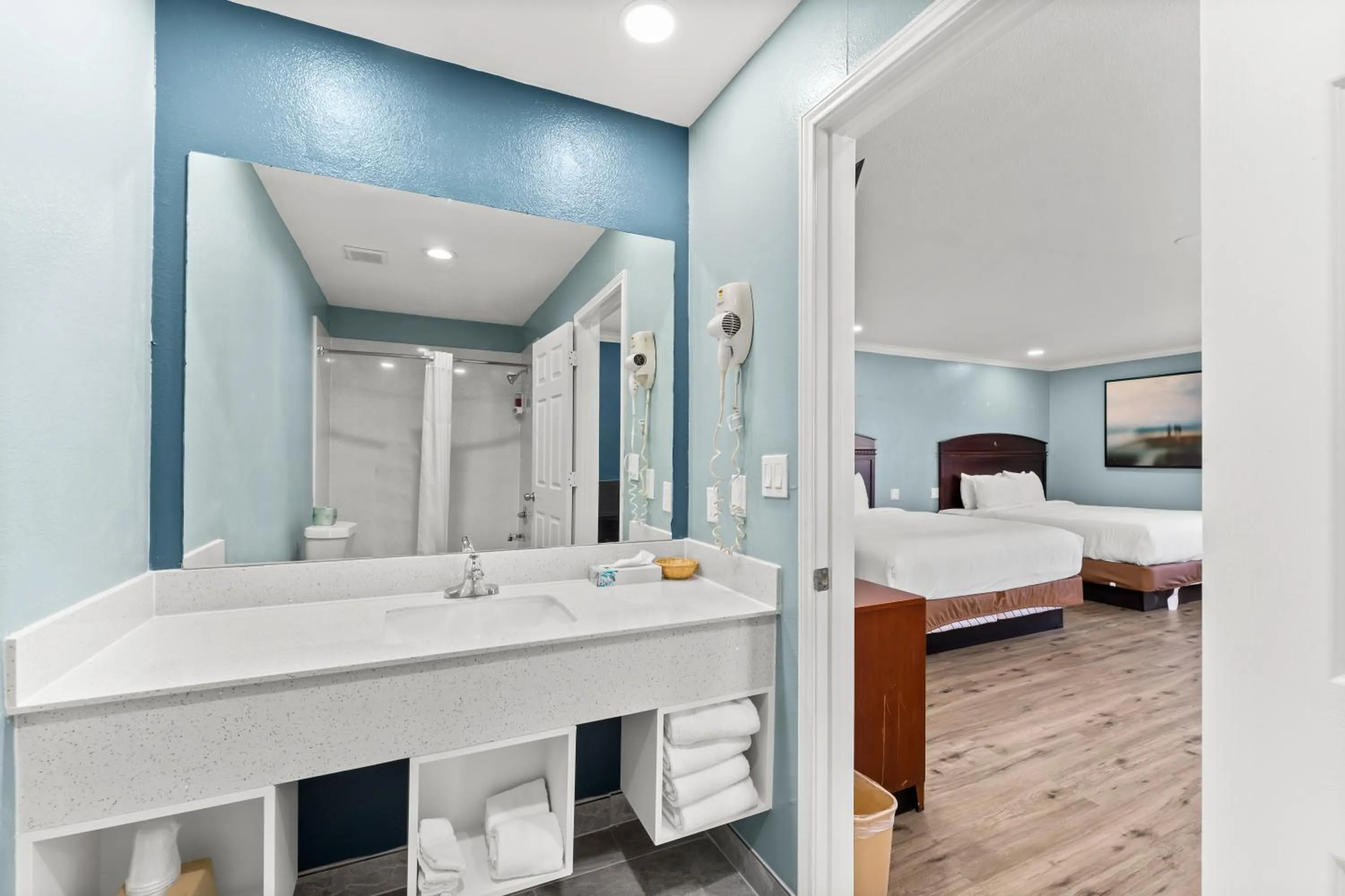 Bed in Executive Inn & Suites Magnolia