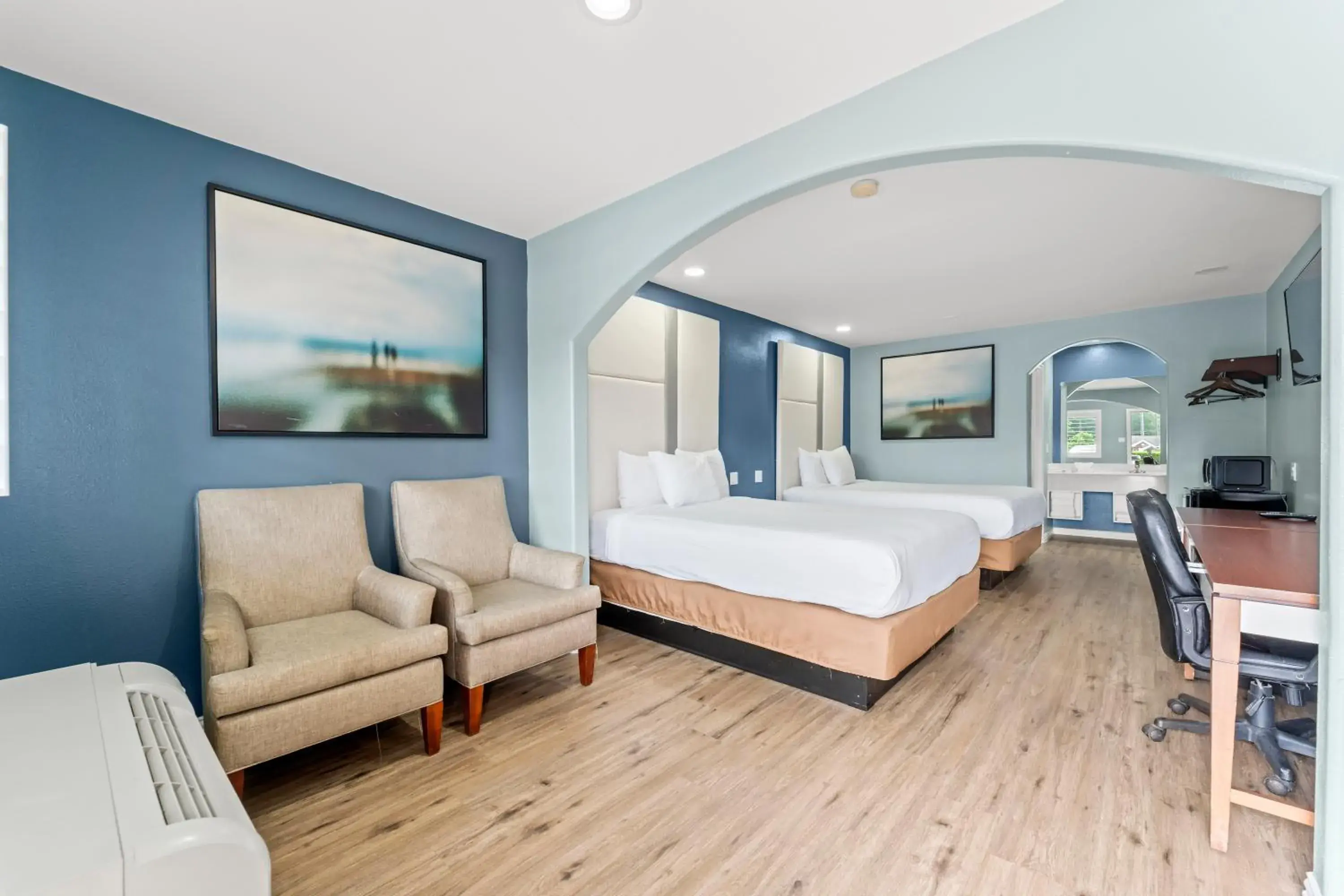 Bed in Executive Inn & Suites Magnolia Bed in Executive Inn & Suites Magnolia