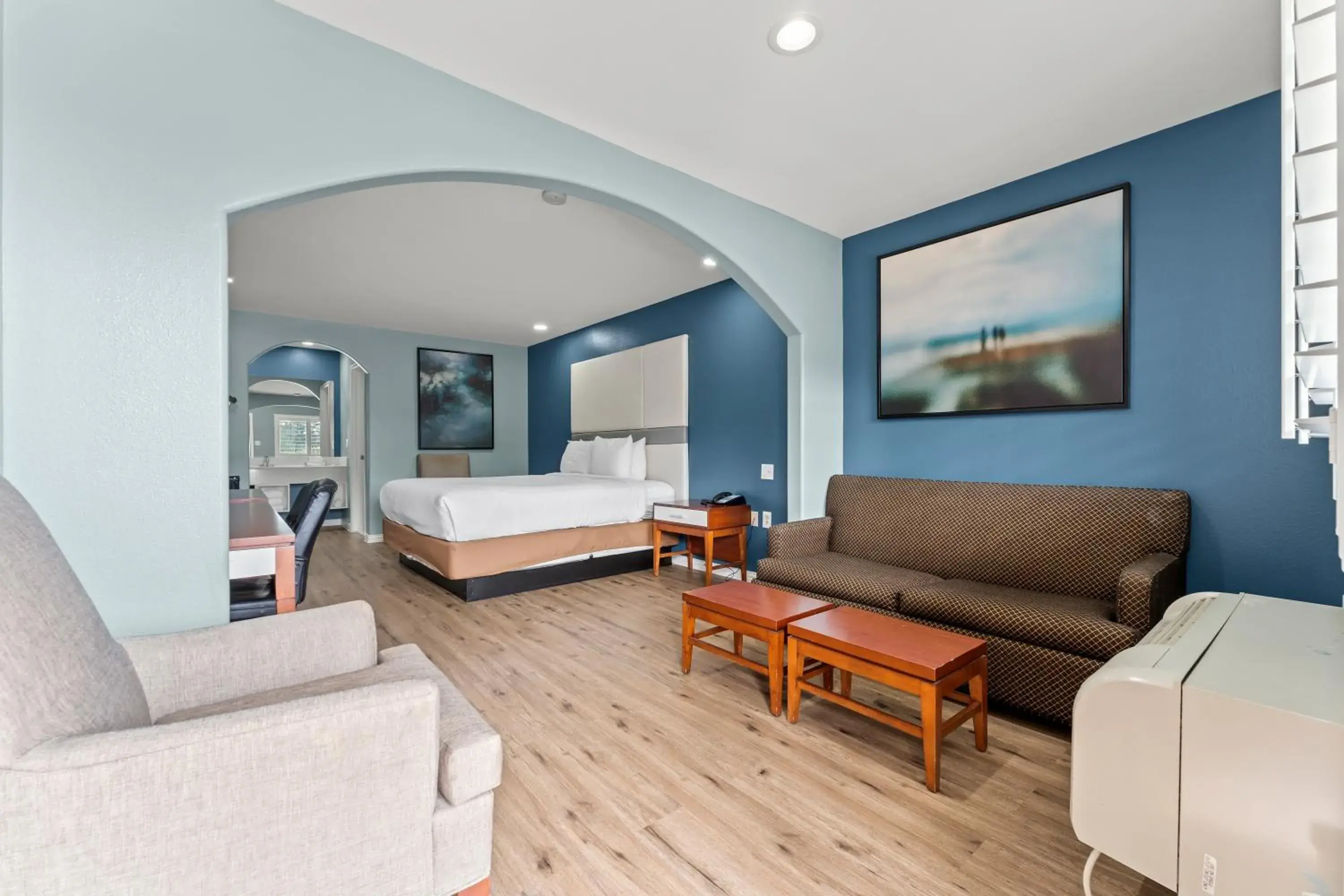 King Room in Executive Inn & Suites Magnolia King Room in Executive Inn & Suites Magnolia