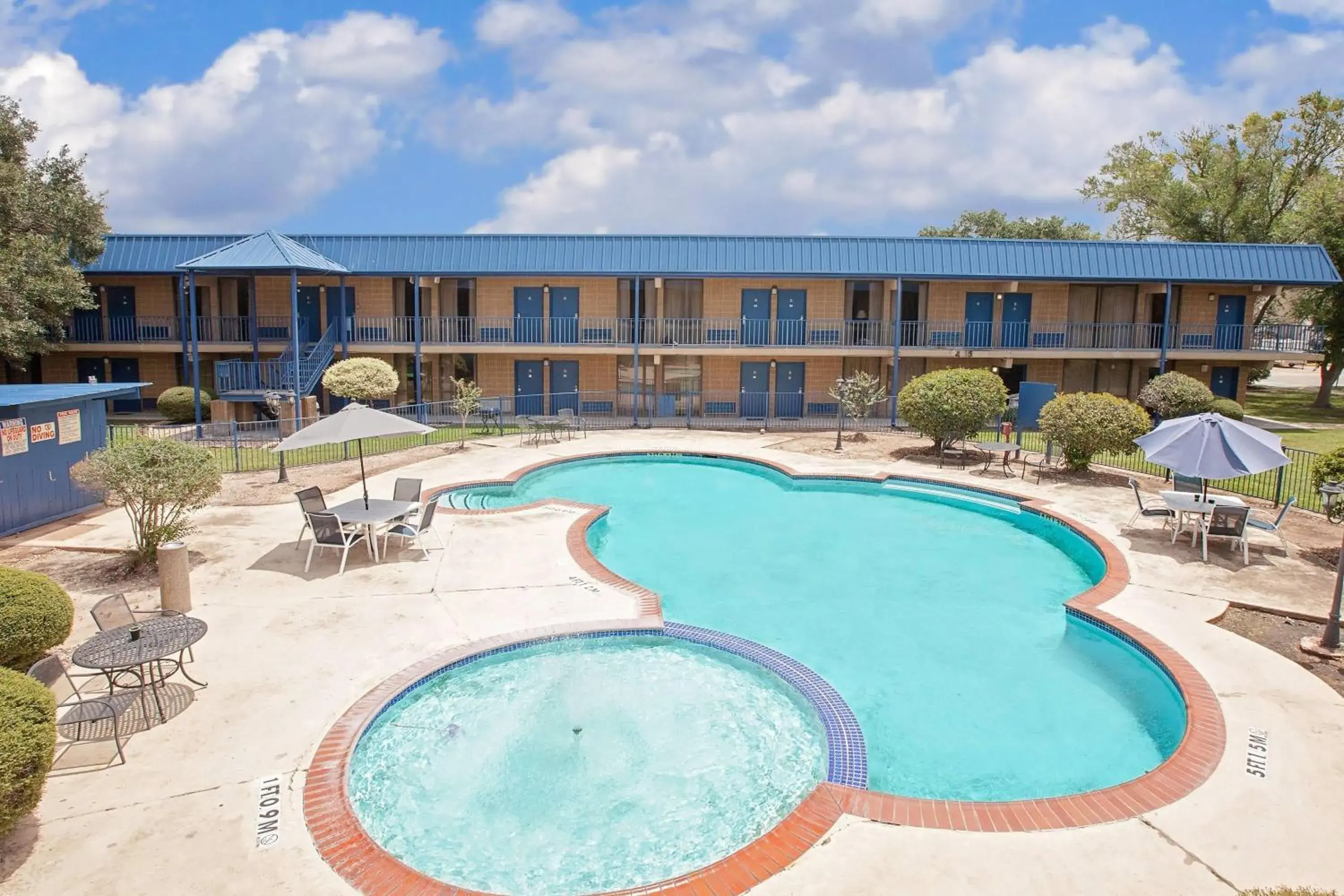 Pool view in Days Inn by Wyndham Bay City Pool view in Days Inn by Wyndham Bay City