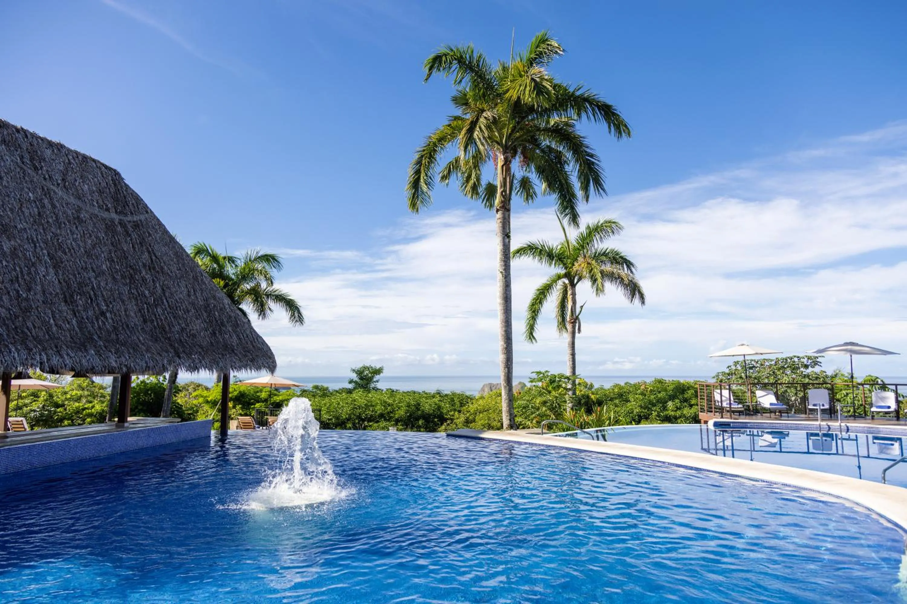Swimming pool in Parador Nature Resort and Spa