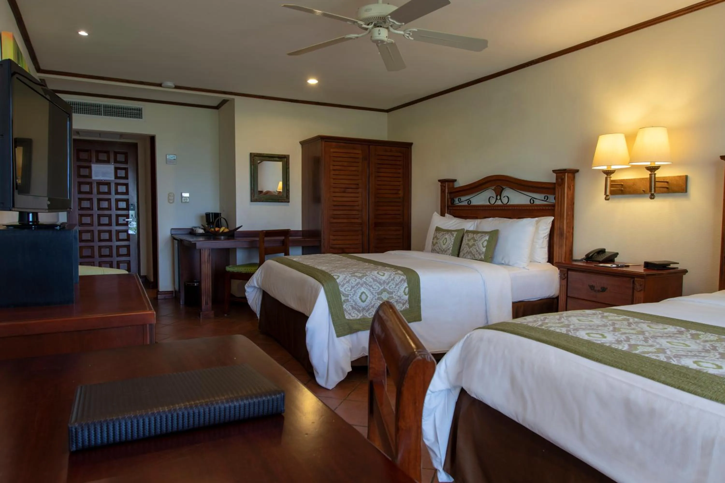 Bed in Parador Nature Resort and Spa