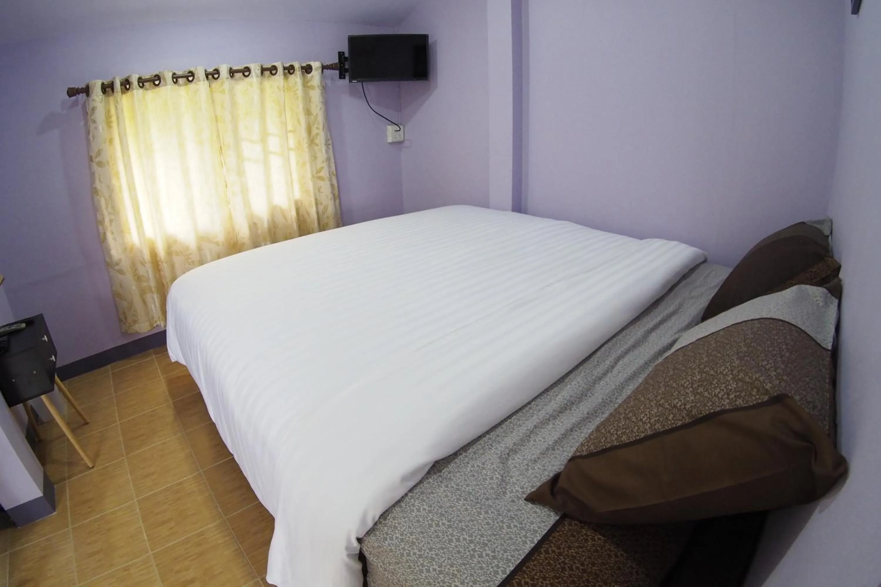 Bed in Pan Din Boutique Guest House