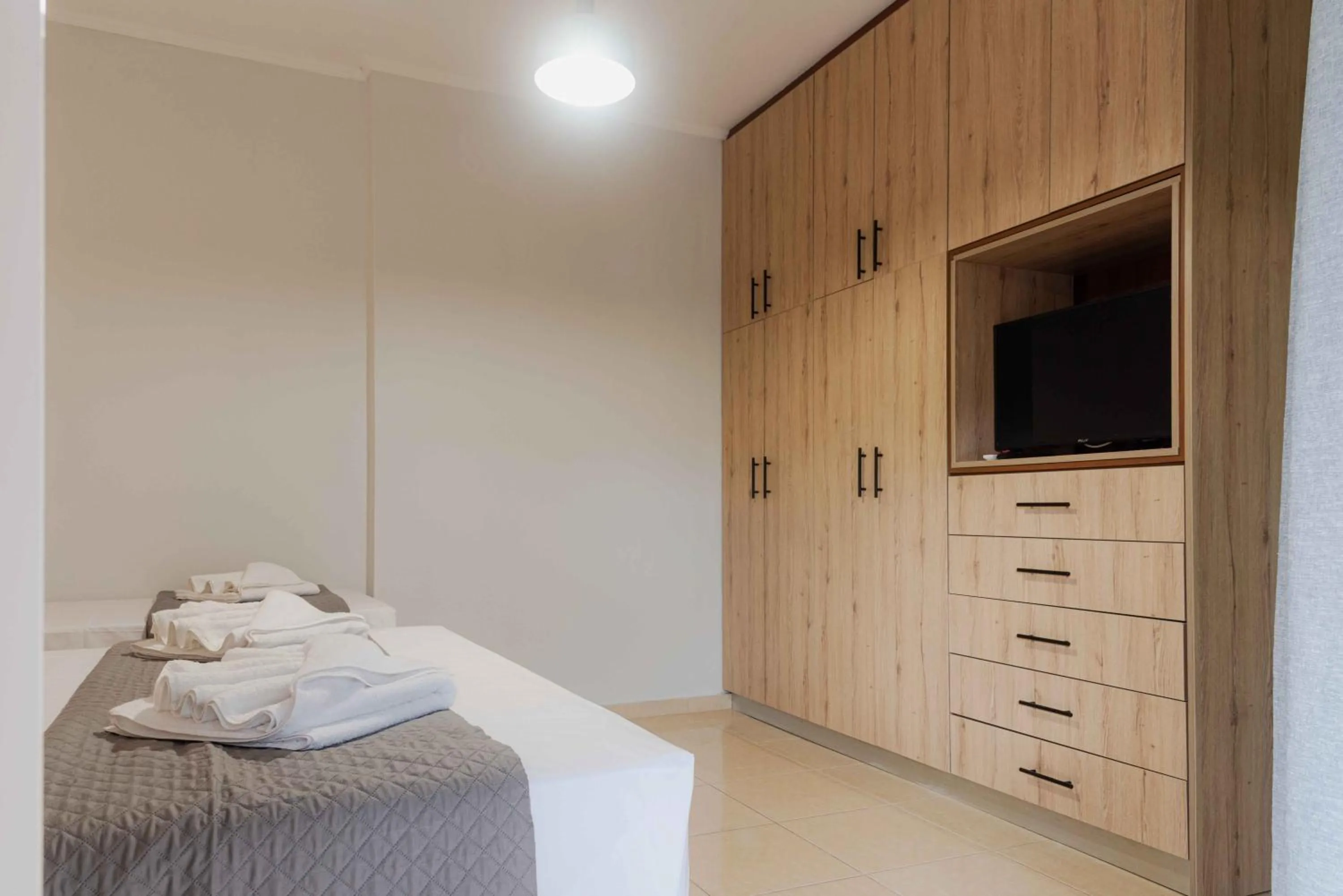 Bedroom, Bed in Riposo Studios & Apartments