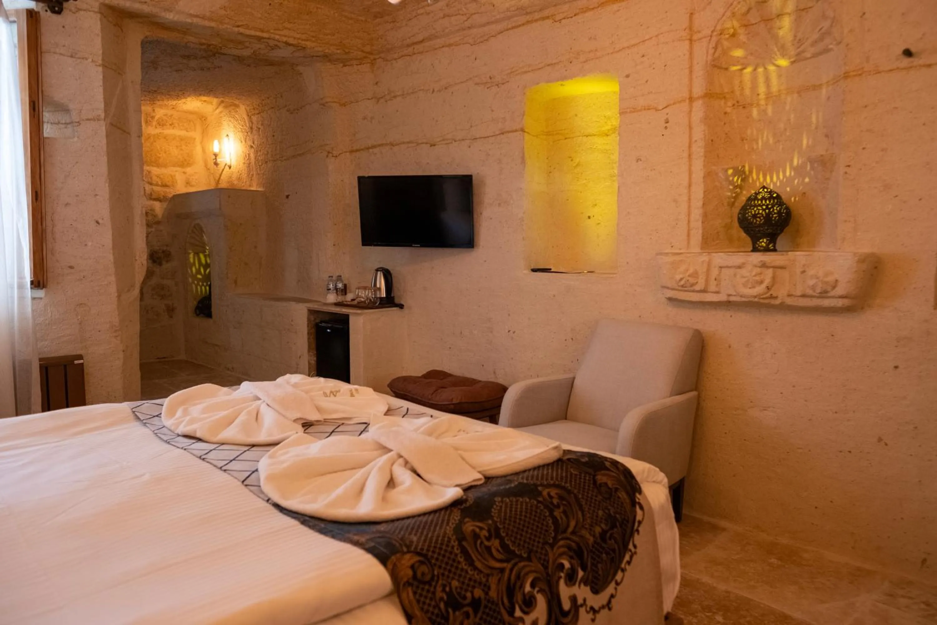 Bed in Urgup Evi Cave Hotel