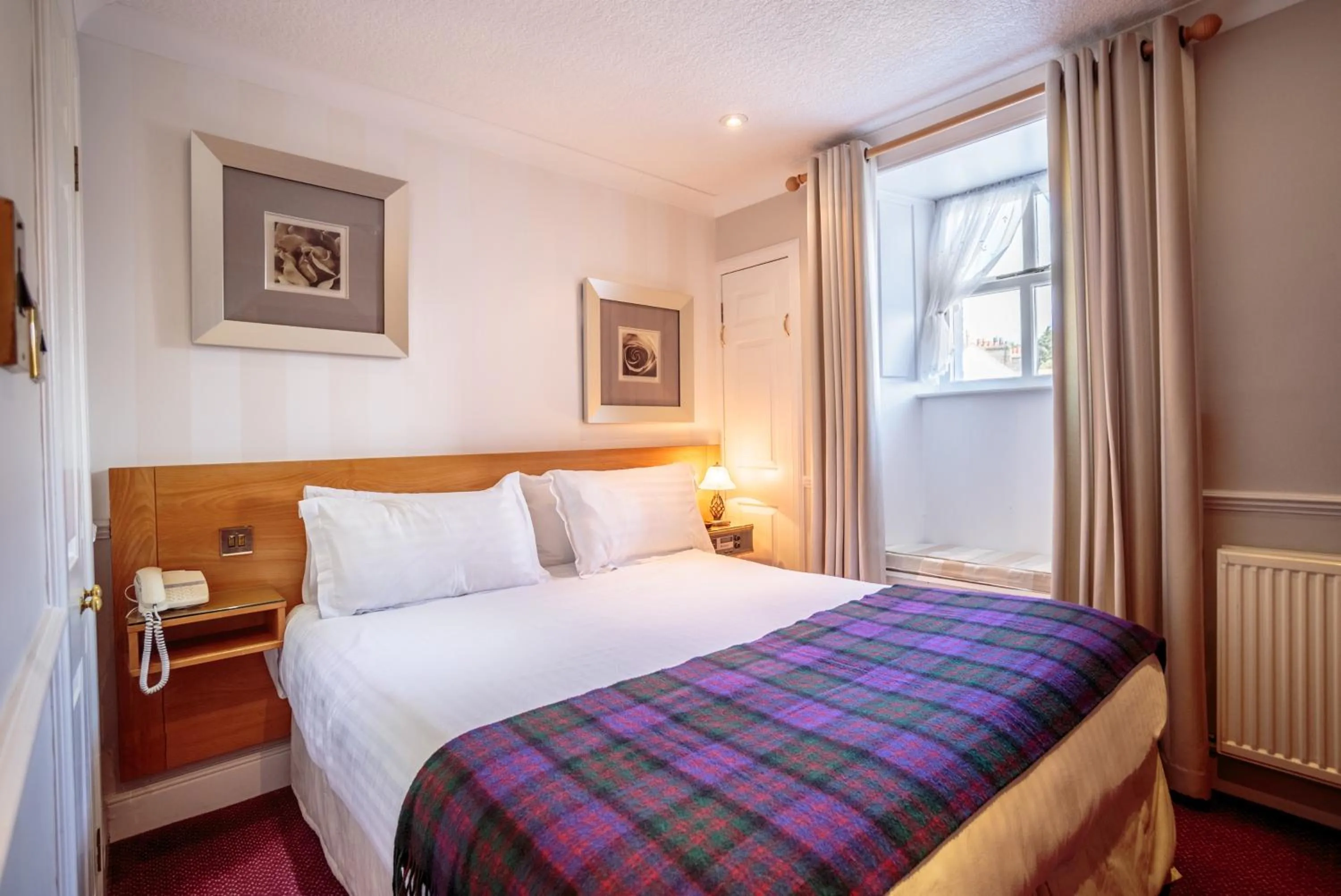 Photo of the whole room, Bed in The Waterfront