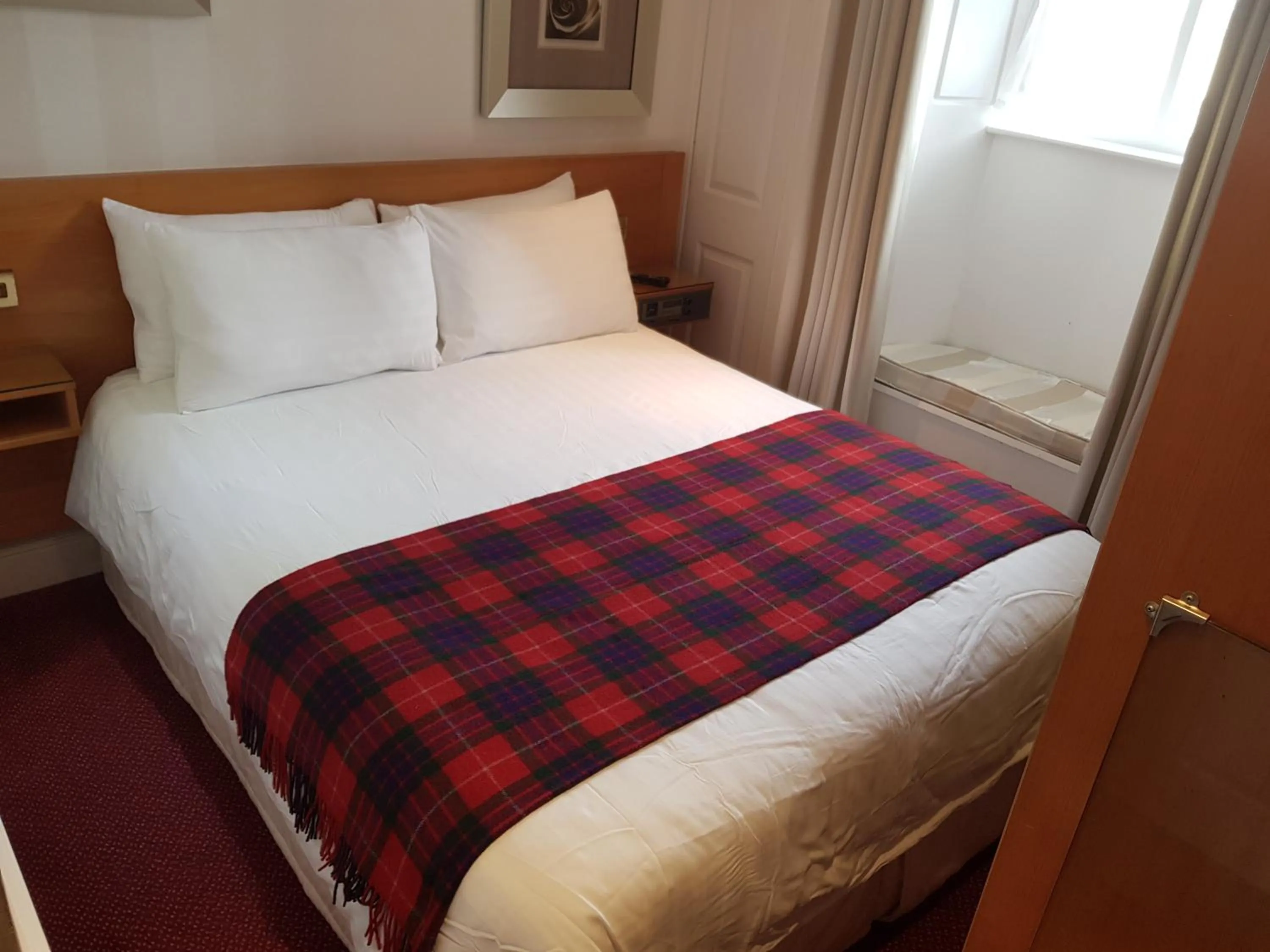 Photo of the whole room, Bed in The Waterfront