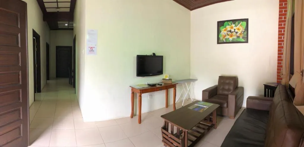 Communal lounge/ TV room in Jasmine Villa