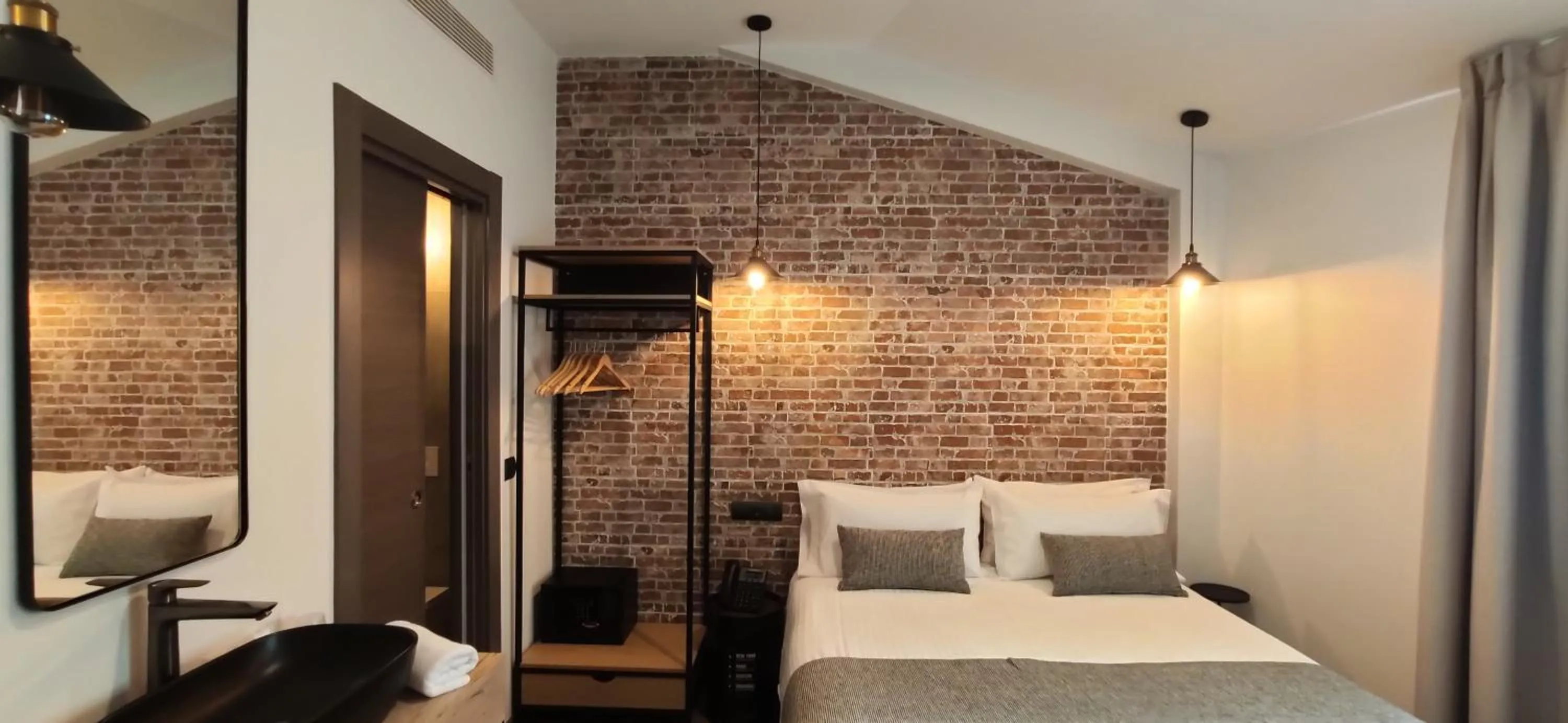 Bed in Le Petit Boutique Hotel