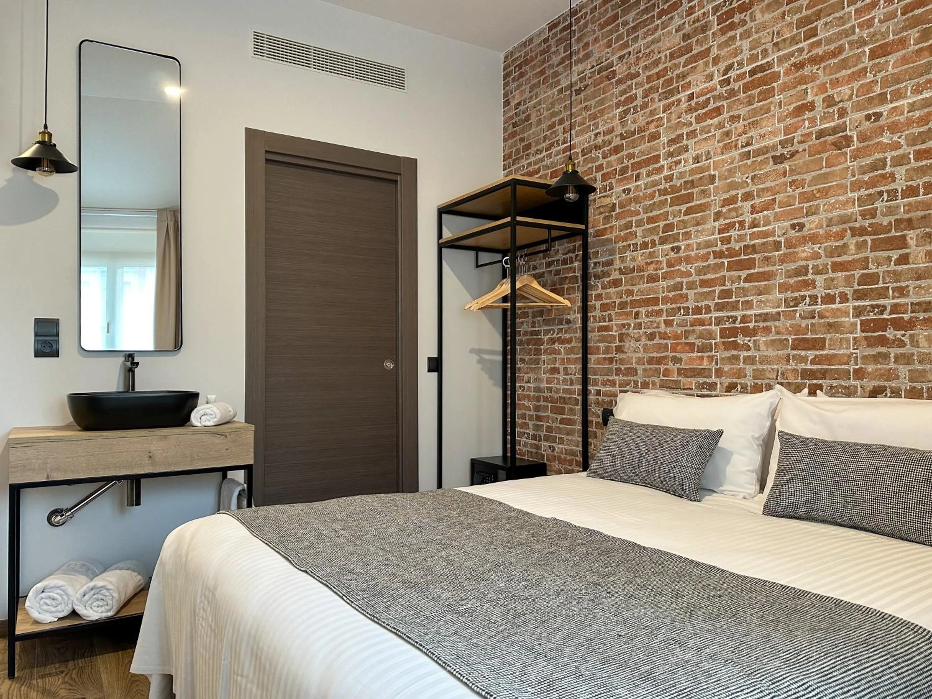 Bed in Le Petit Boutique Hotel