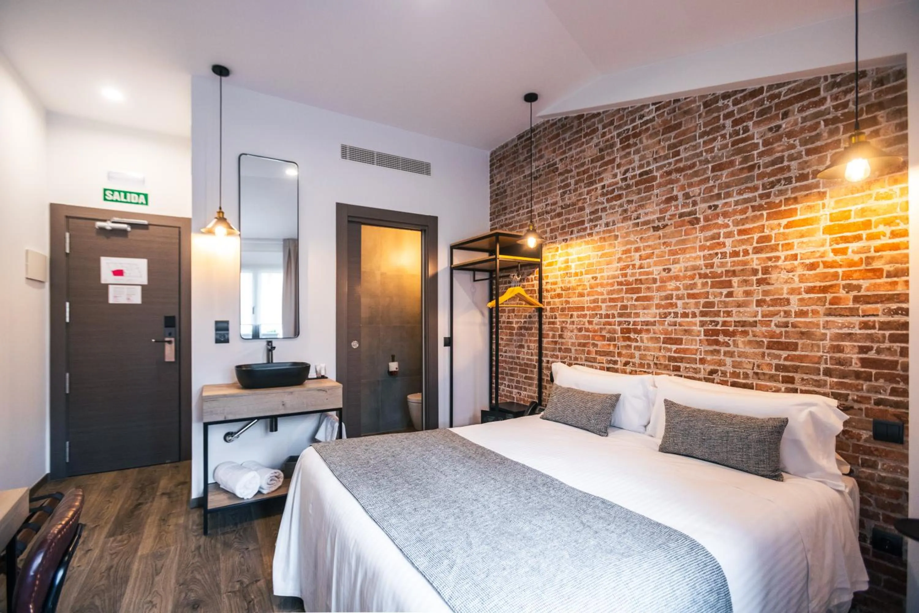 Bed in Le Petit Boutique Hotel