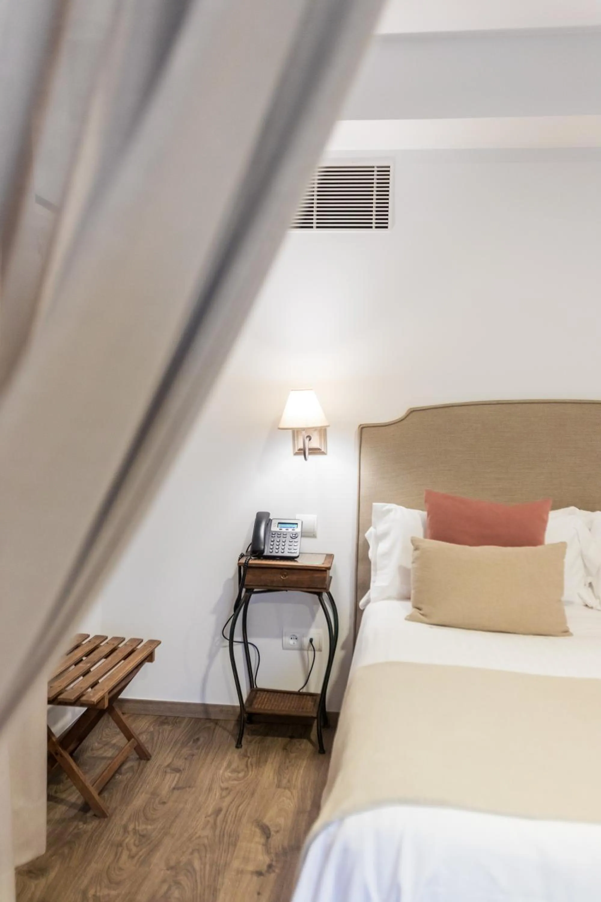 Bed in Le Petit Boutique Hotel