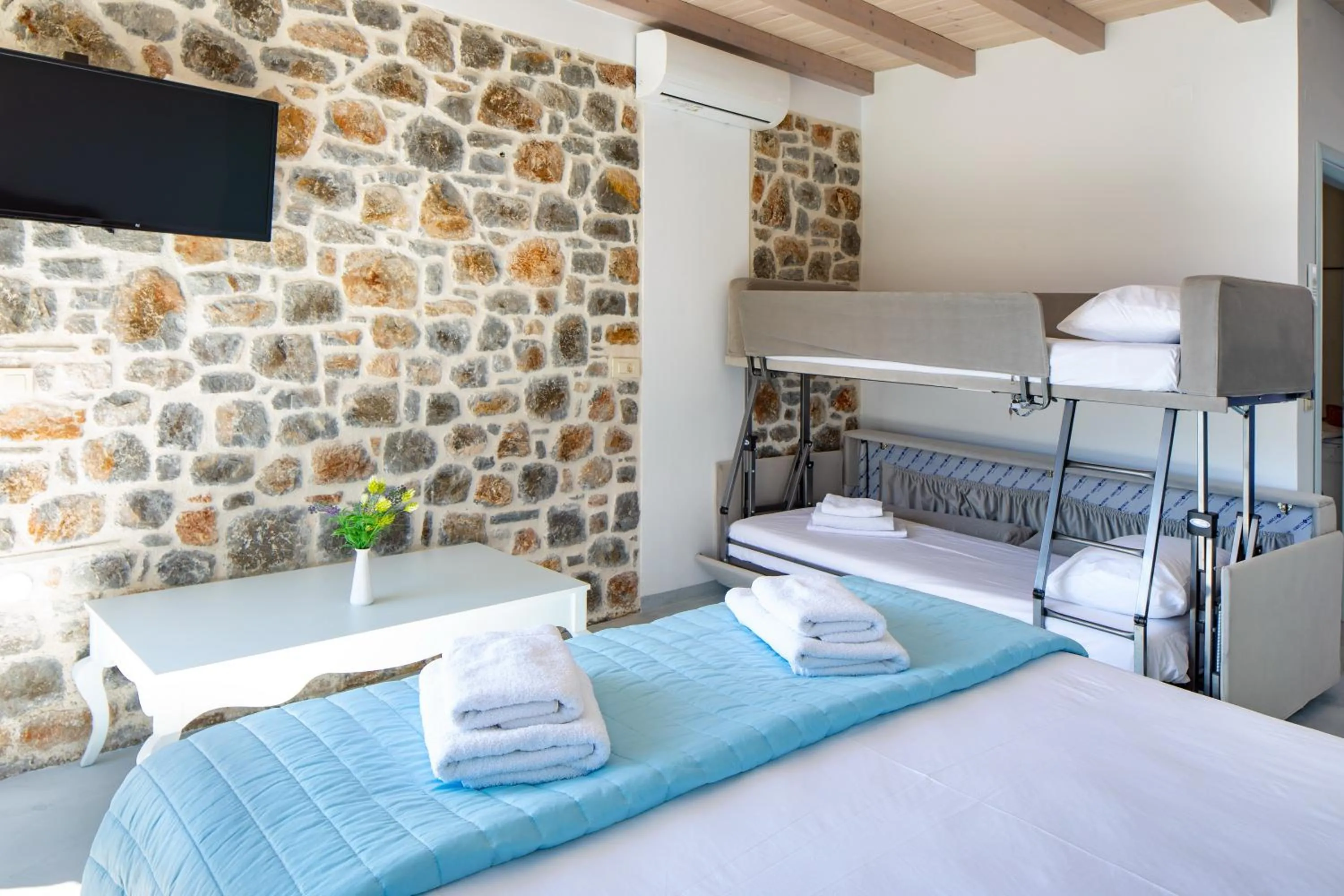 Bed in Molos Apartments