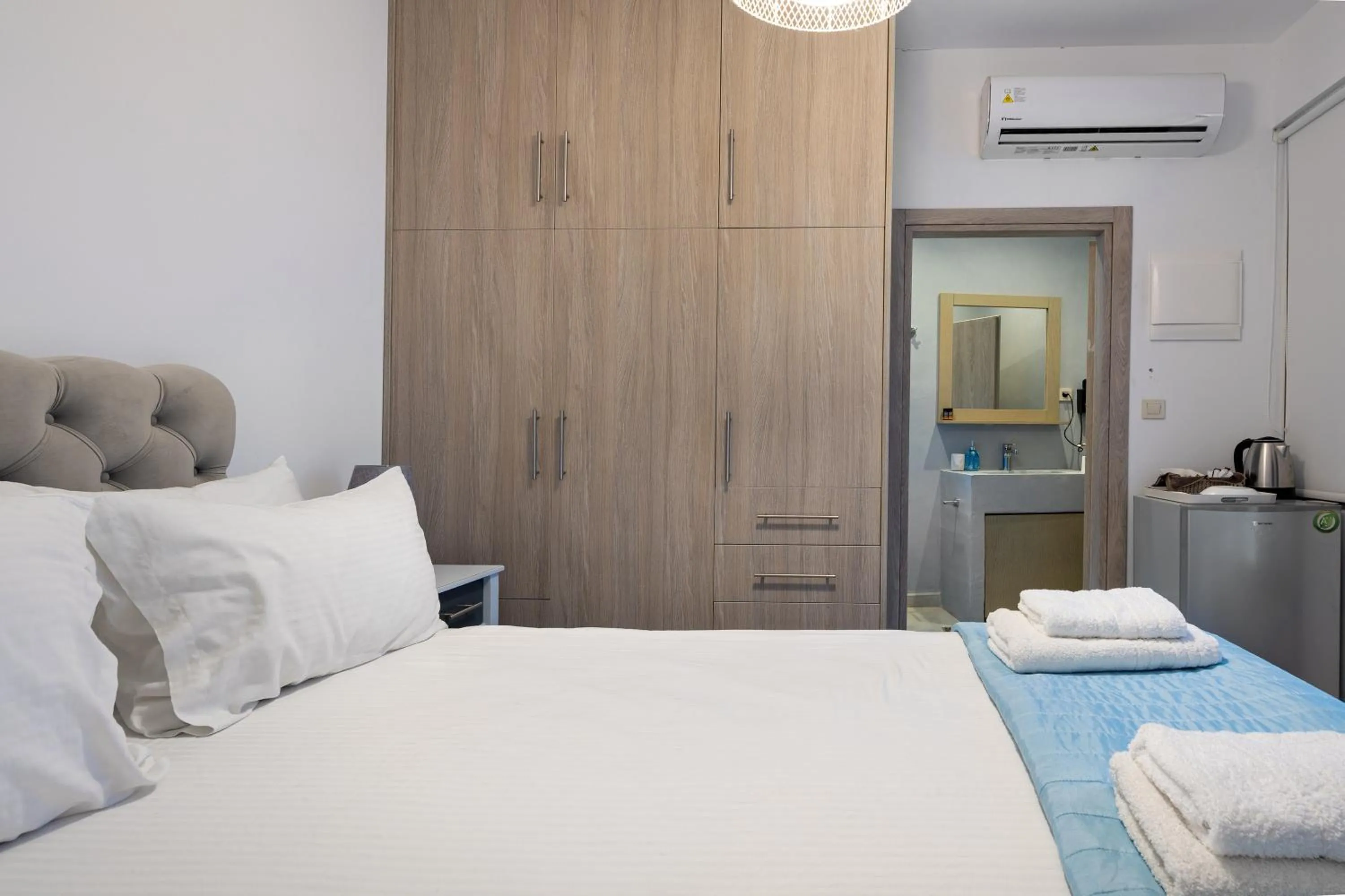 Bed in Molos Apartments