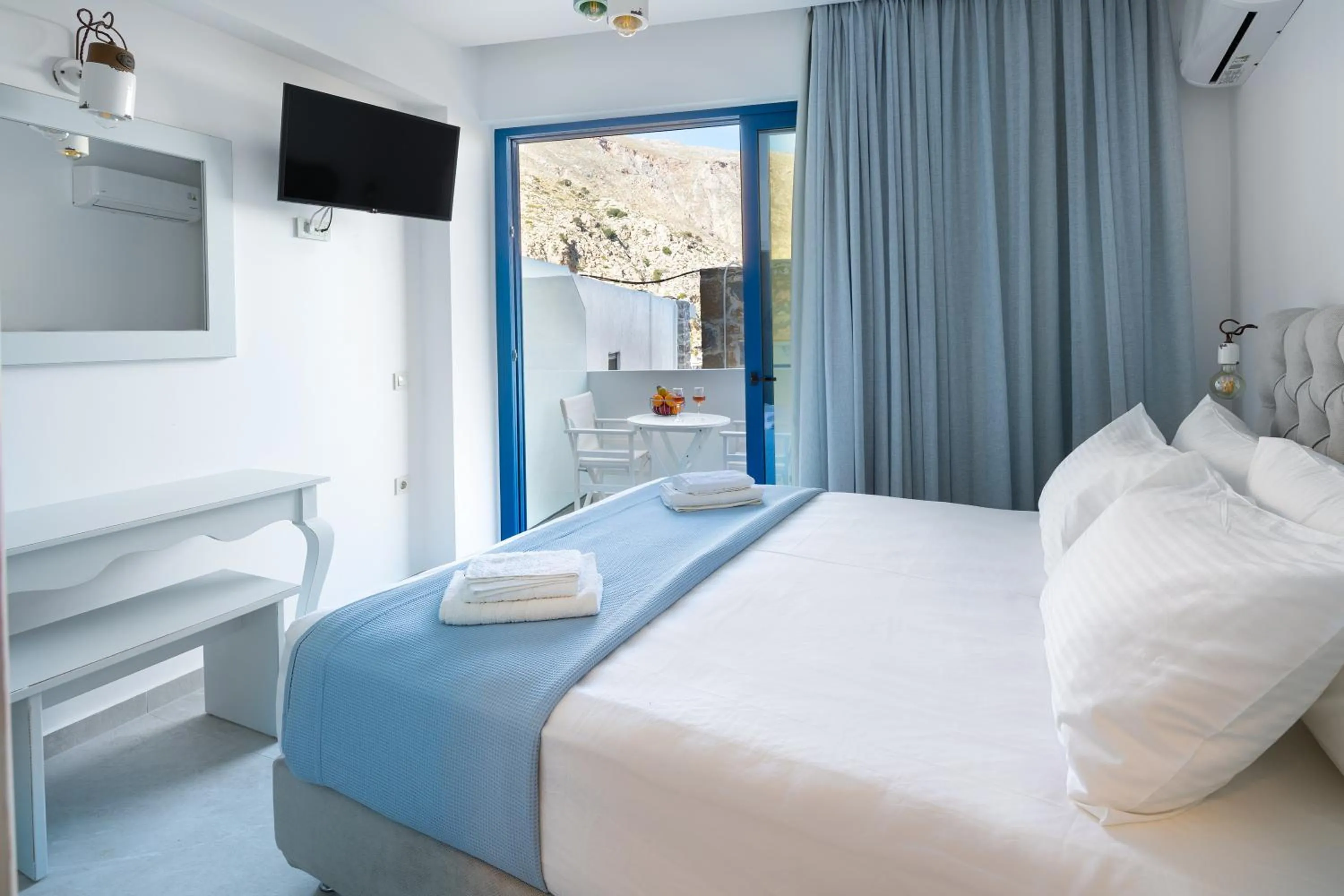 Bed in Molos Apartments