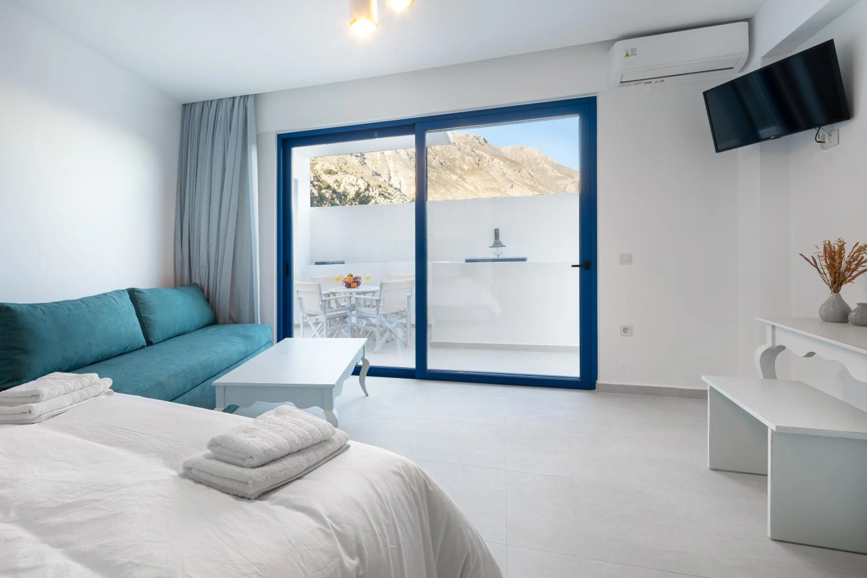 Bed in Molos Apartments