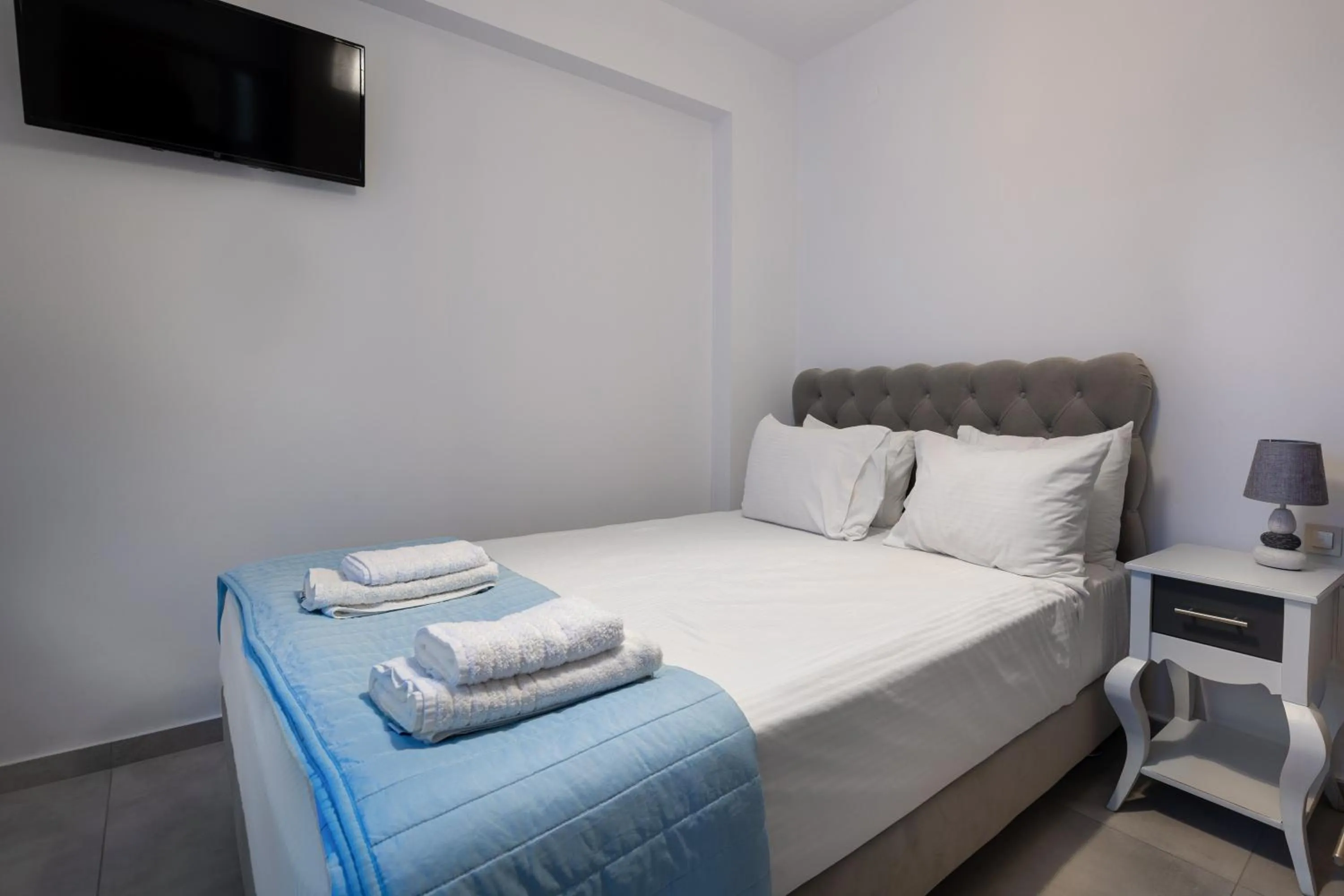 Bed in Molos Apartments