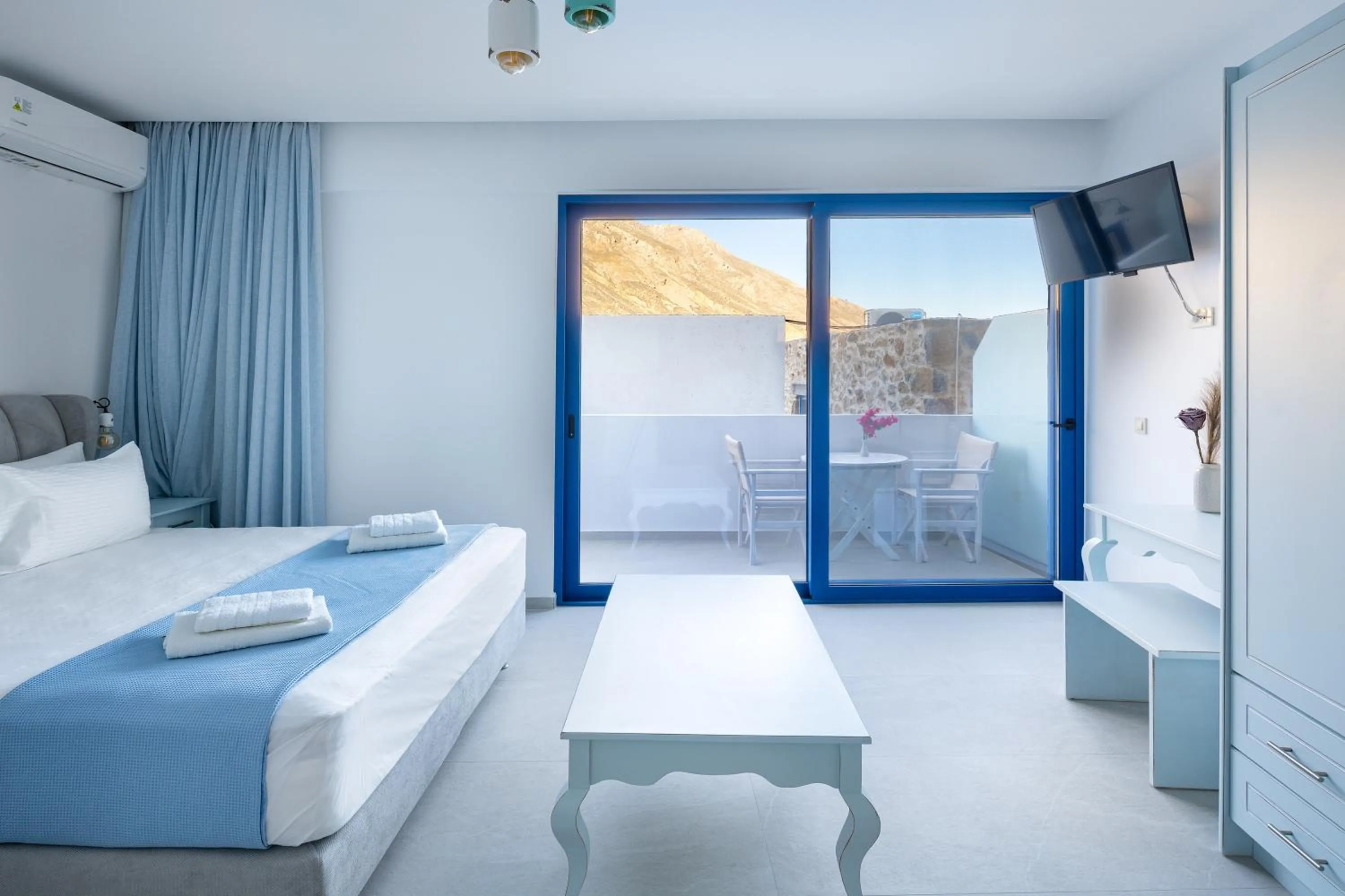 Bed in Molos Apartments