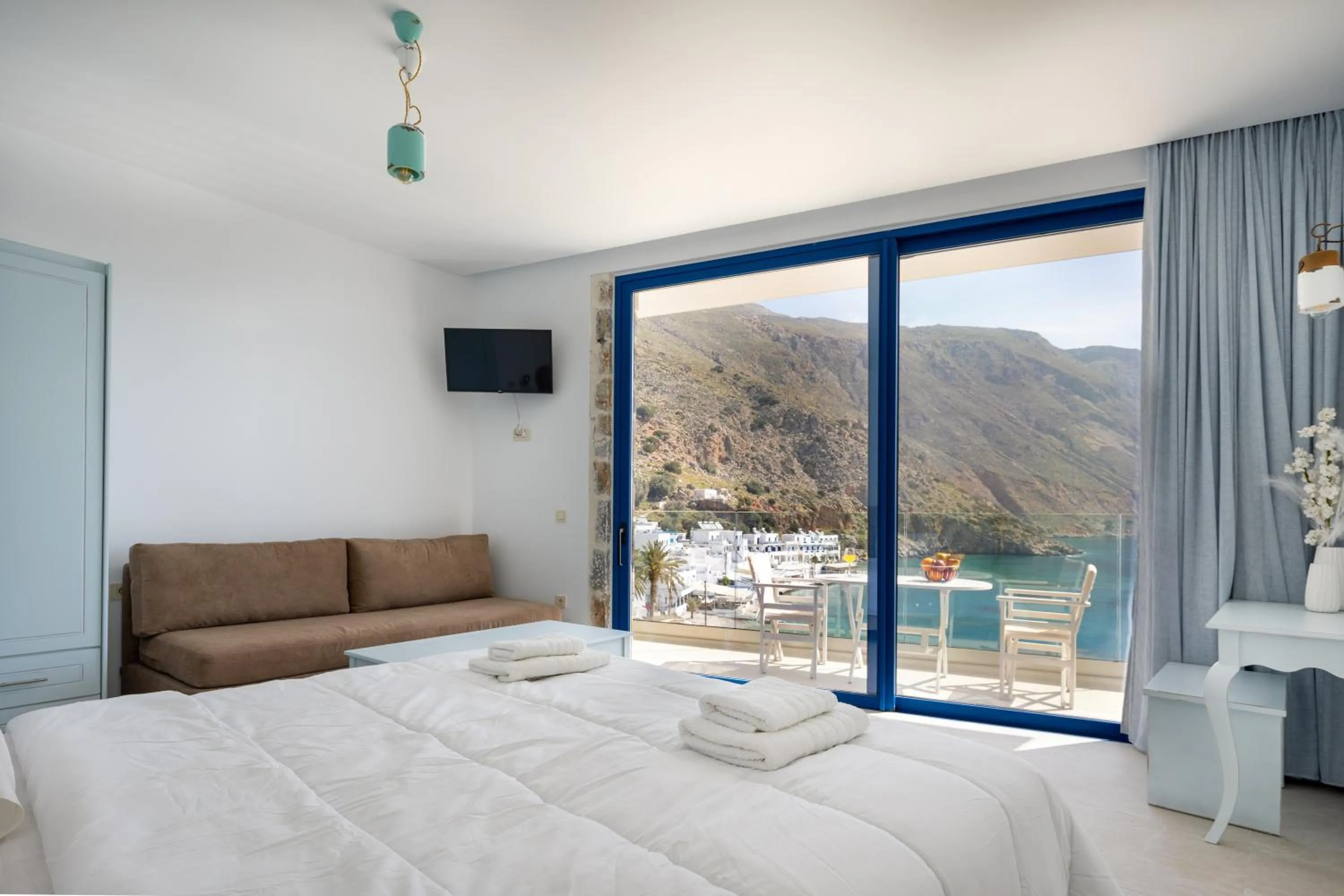 Bed in Molos Apartments