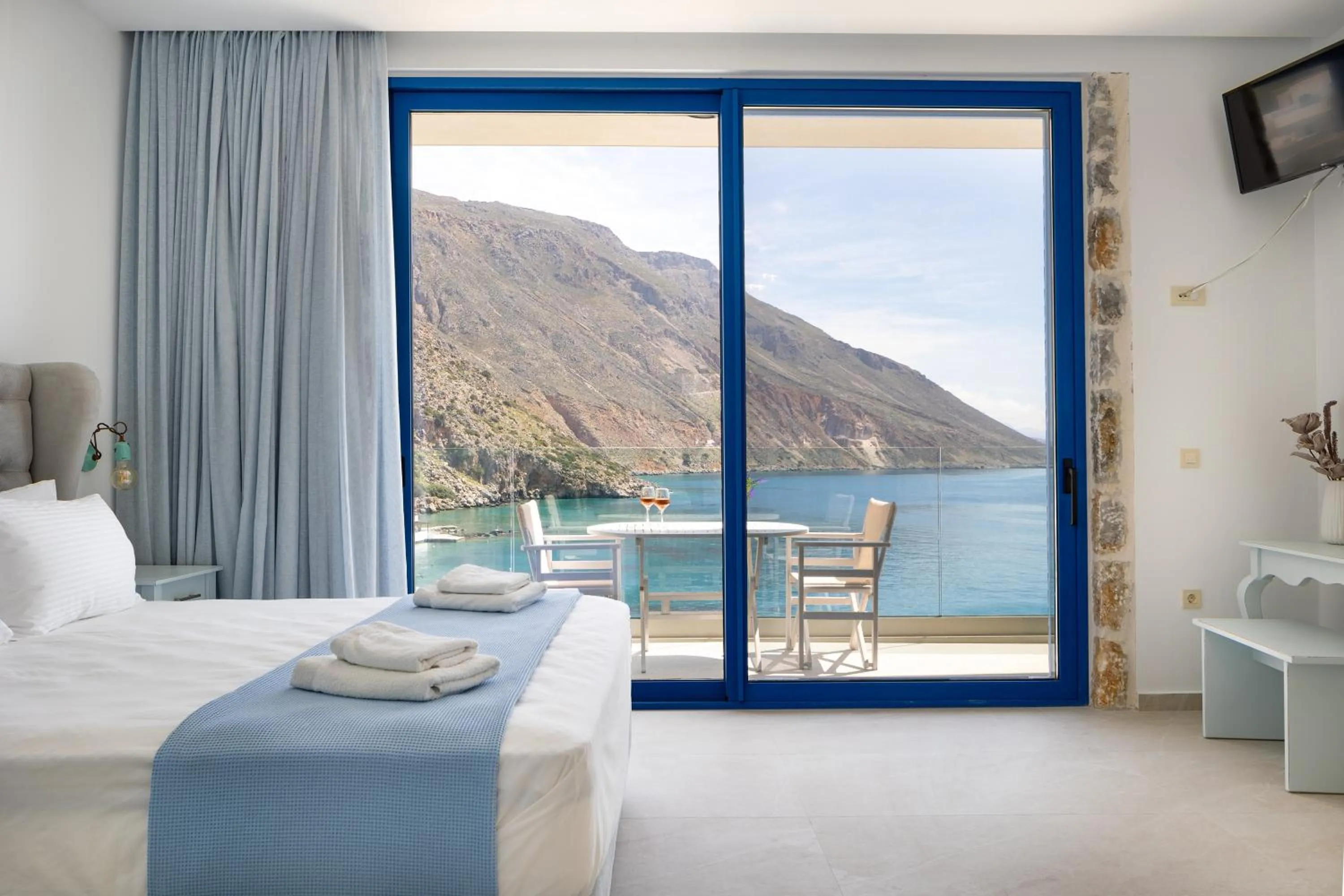 Bed in Molos Apartments