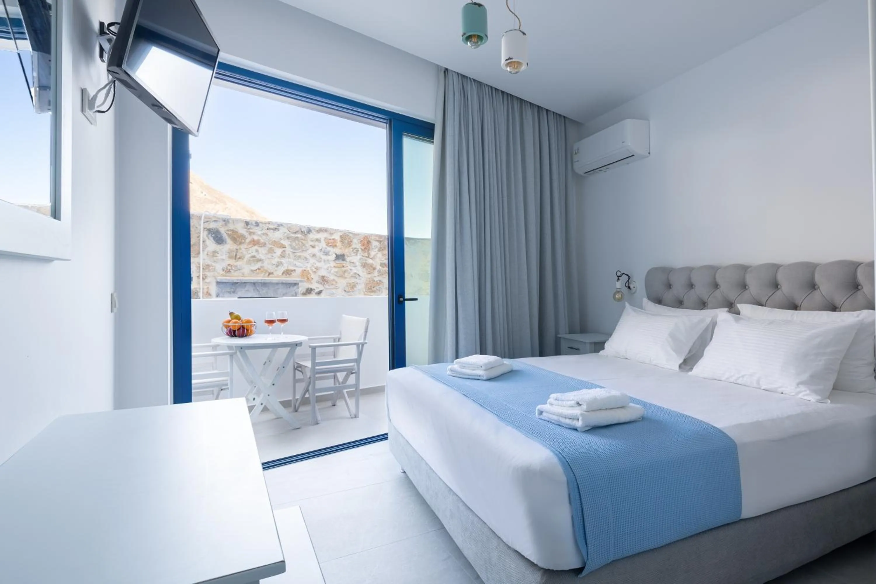 Bed in Molos Apartments
