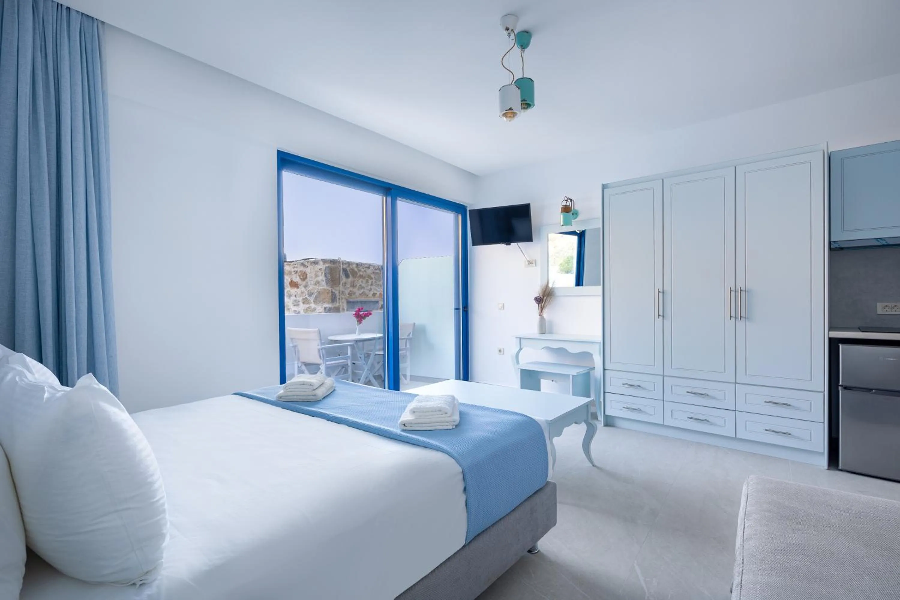 Bed in Molos Apartments