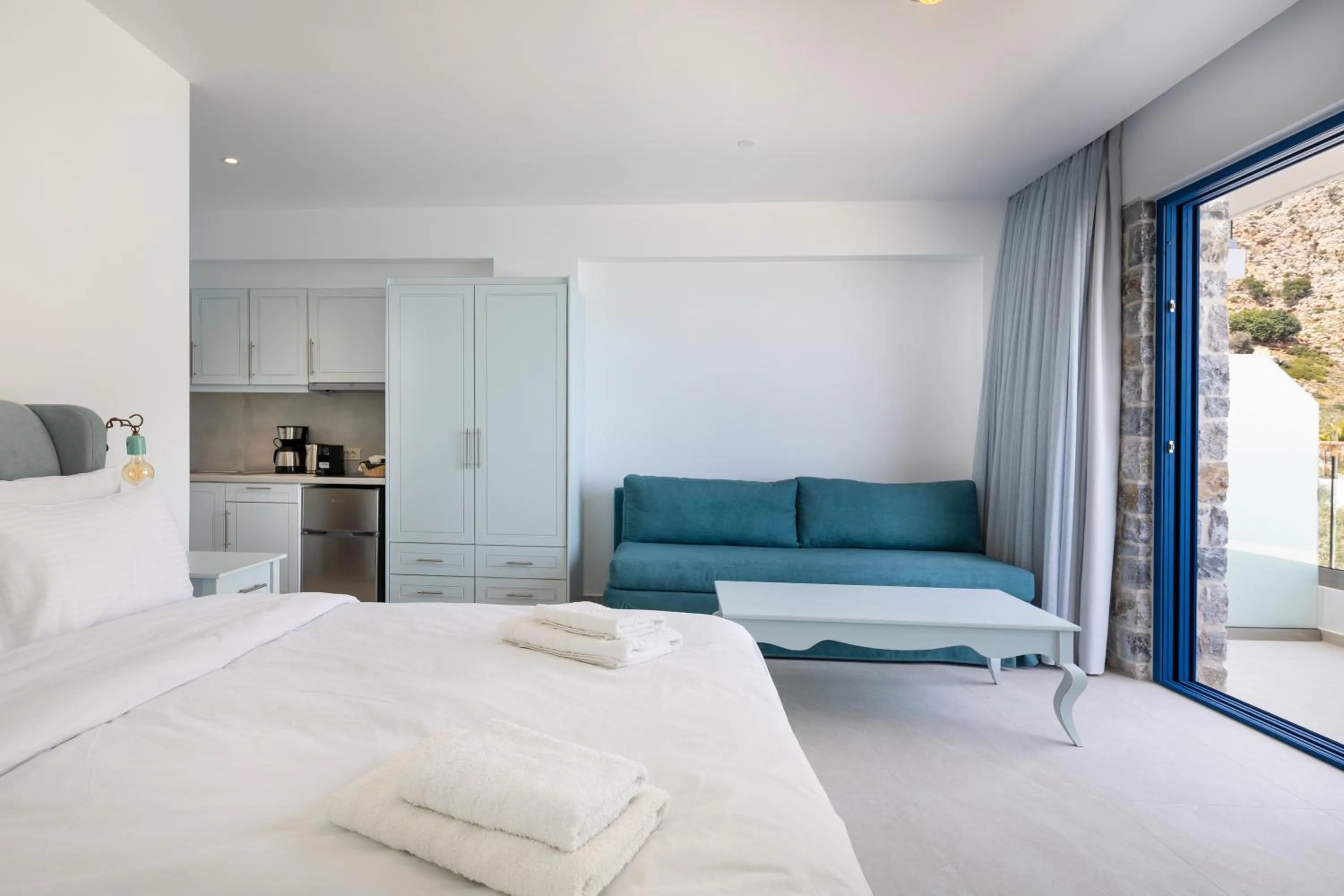 Bed in Molos Apartments